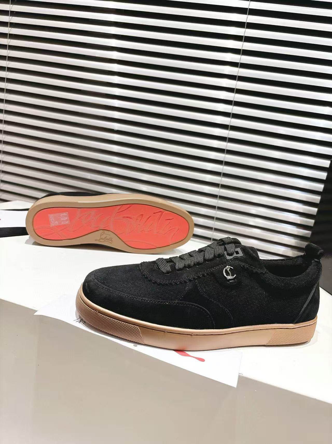 UA Christian Louboutin Sneaker
