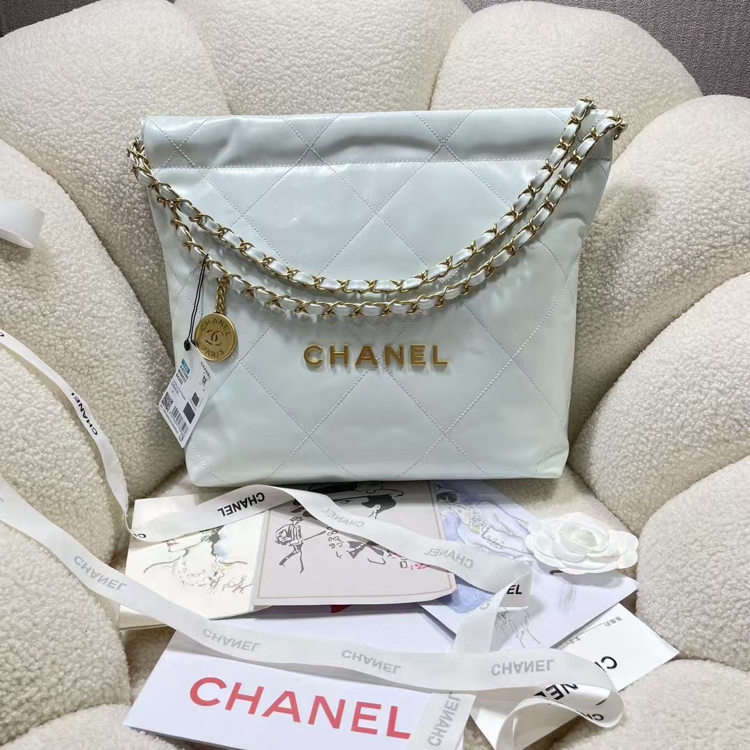 CHANEL 22 SMALL HANDBAG Shiny Calfskin Light Blue 37X35X7cm