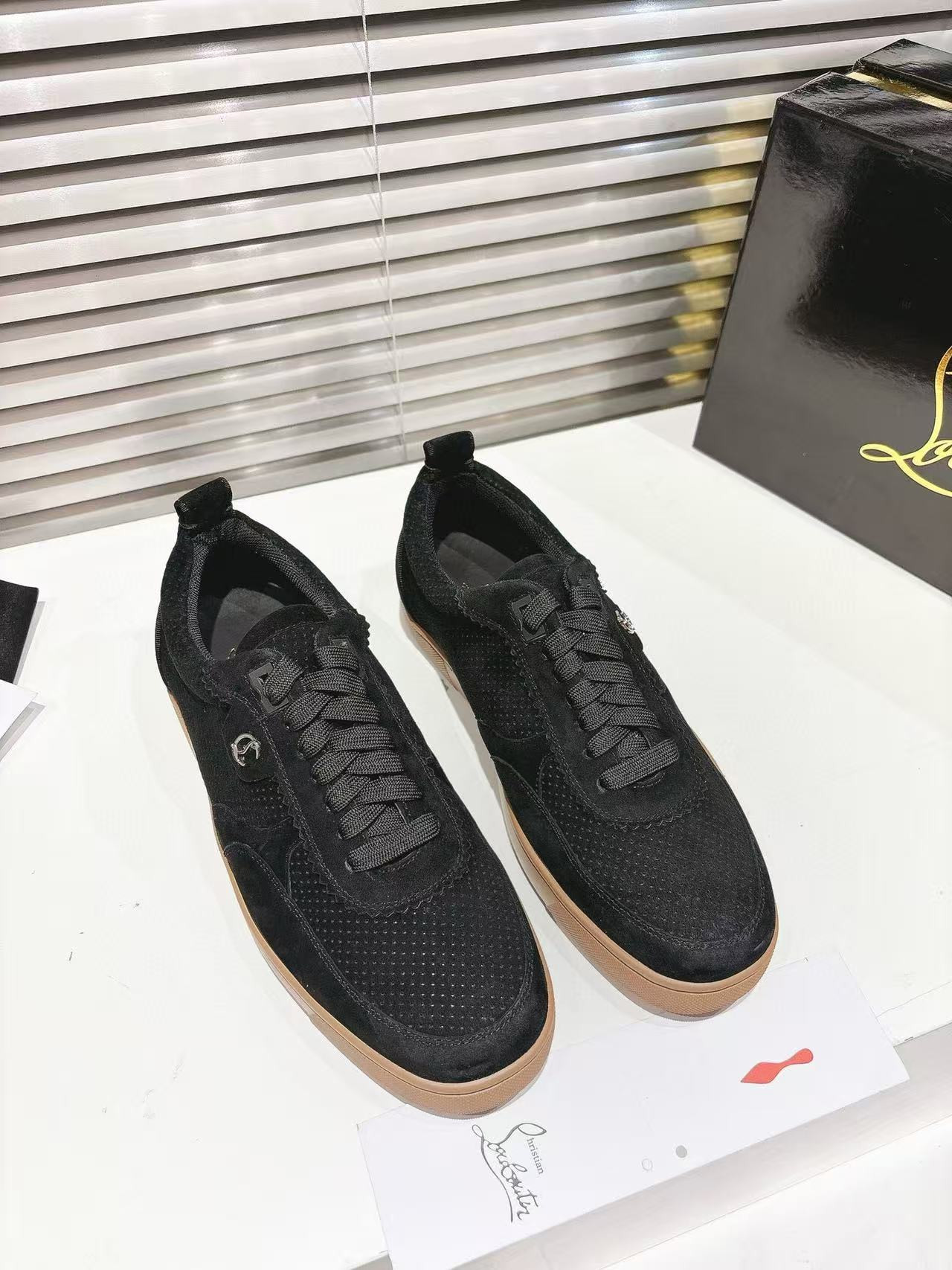 UA Christian Louboutin Sneaker