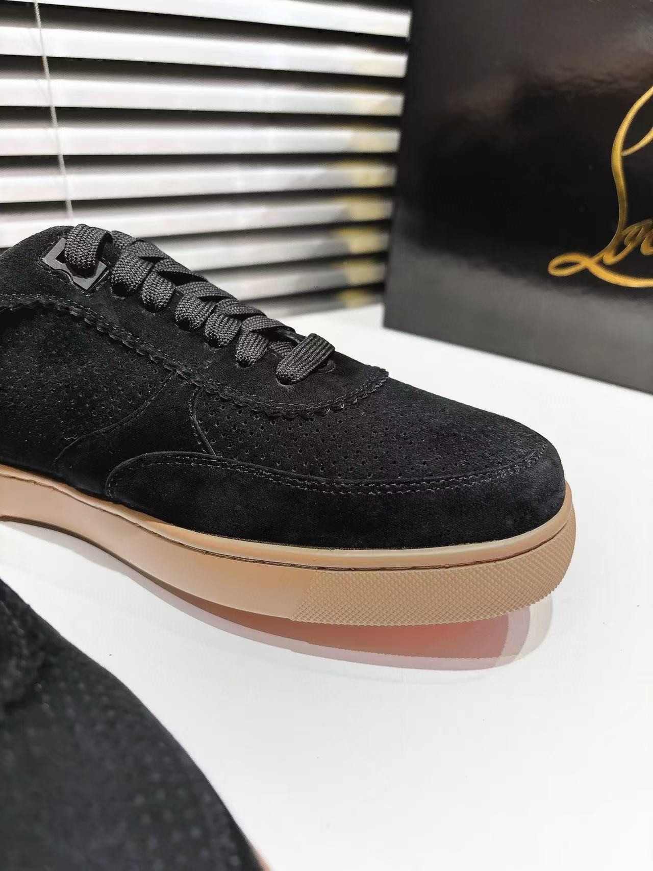 UA Christian Louboutin Sneaker