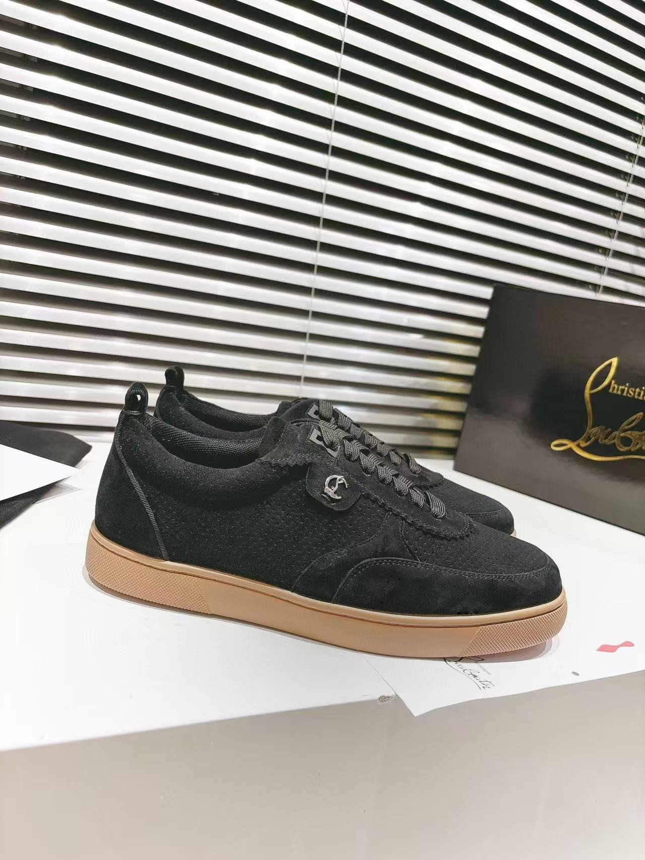 UA Christian Louboutin Sneaker