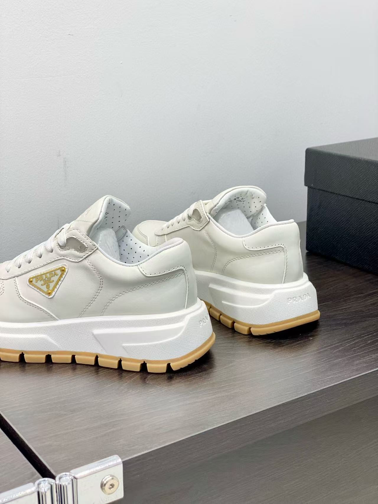 UA Prada Prax 01 leather sneakers