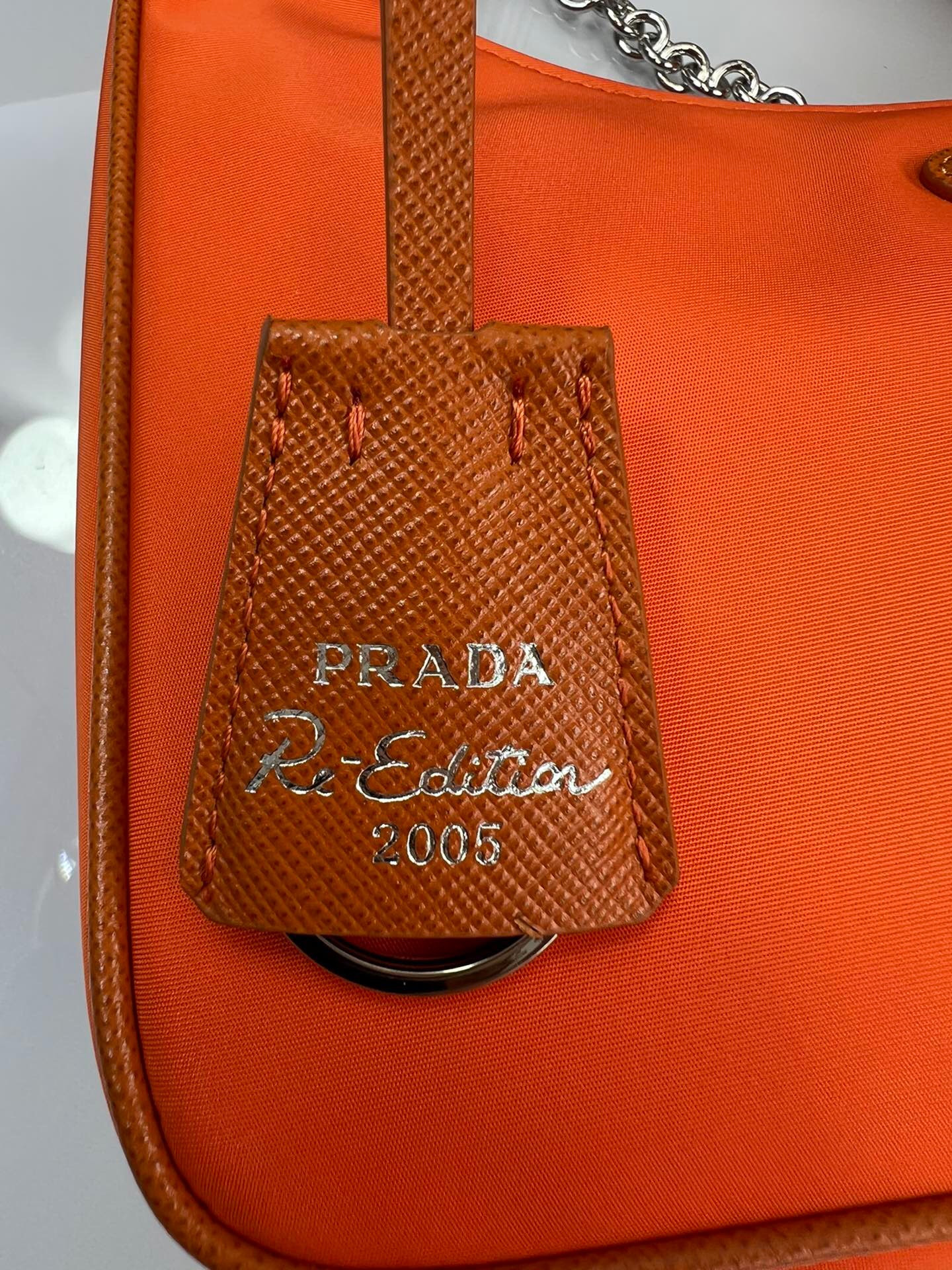 Prada Re-Edition 2005 Re-Nylon bag Orange