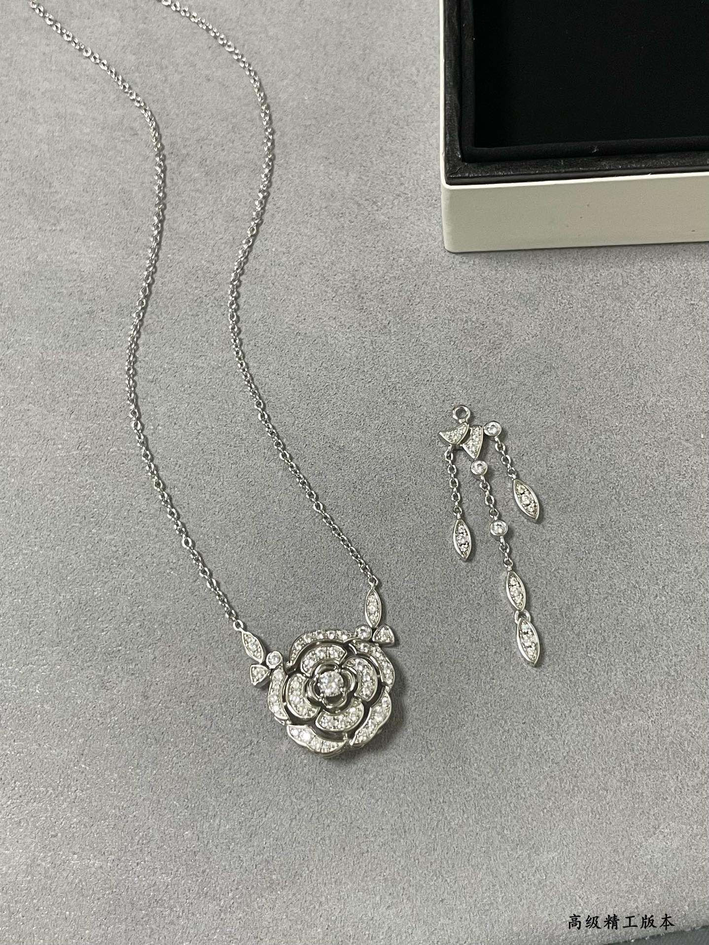 Chanel Camellia Tassel Necklace