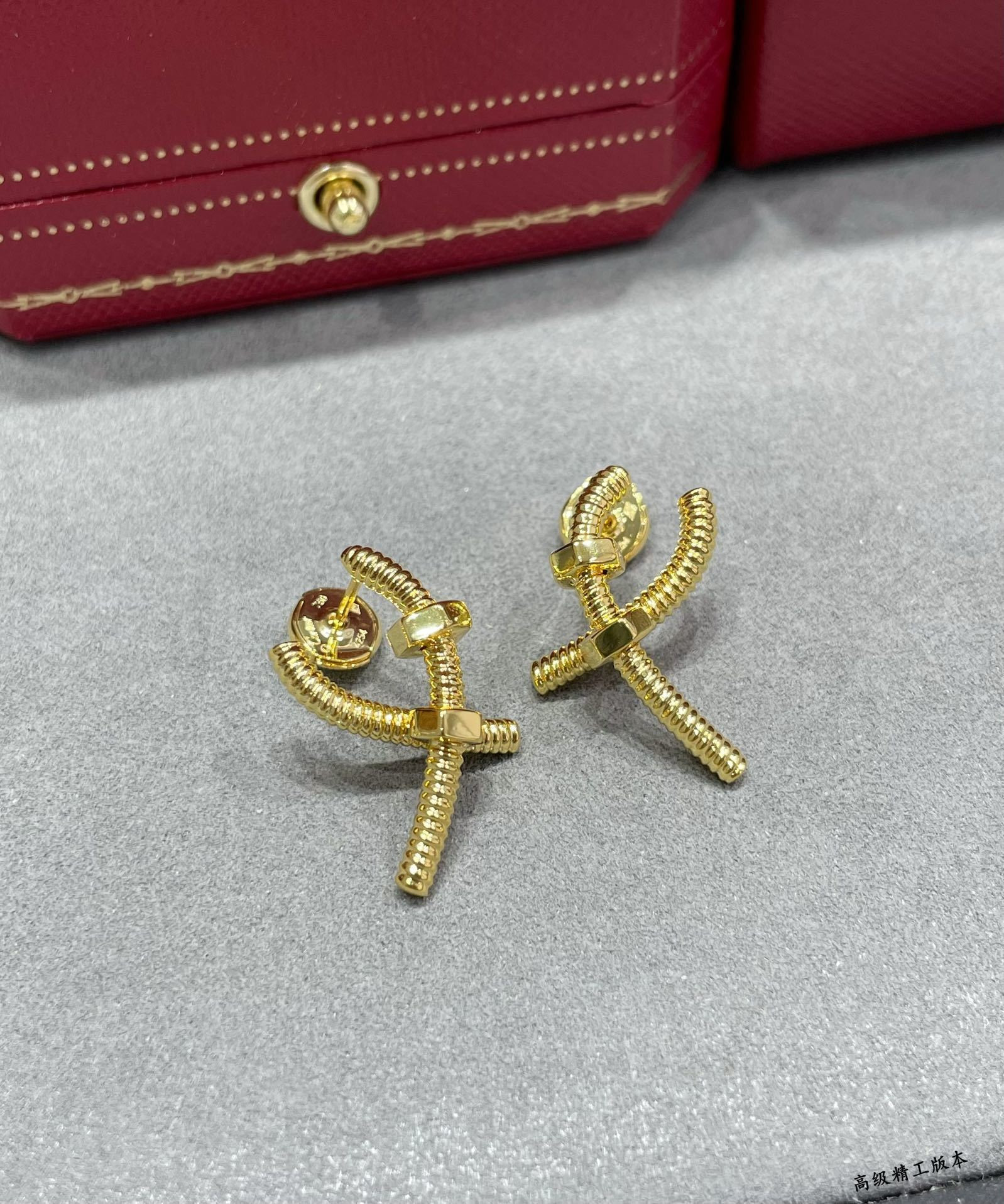 Cartier Cross Screw Earrings
