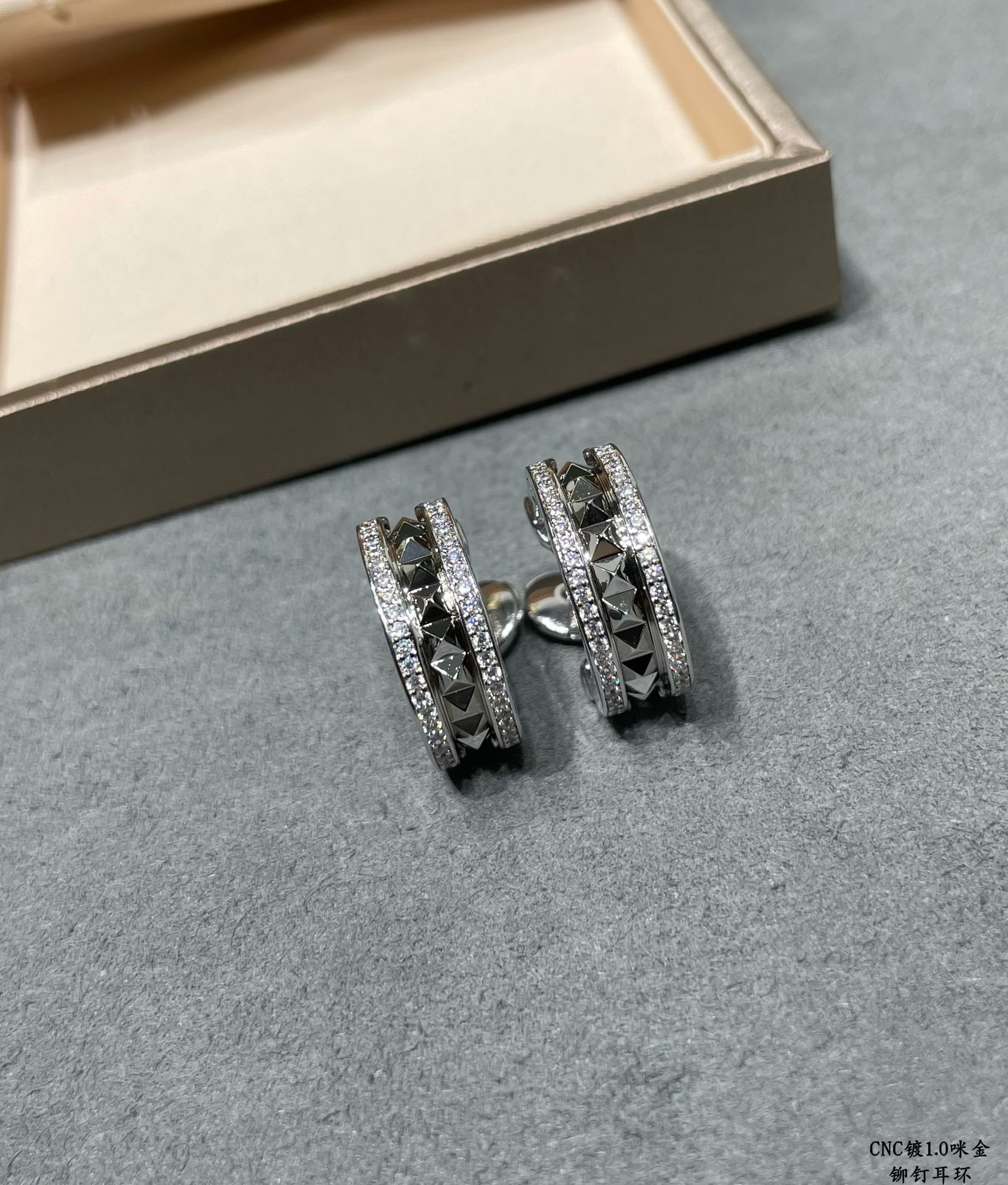 Bvlgari Drill rivets on both sides Earrings
