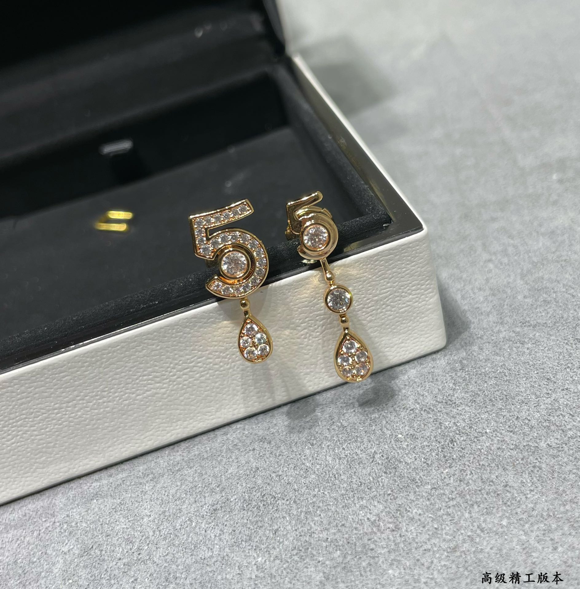Chanel 5-word Earrings