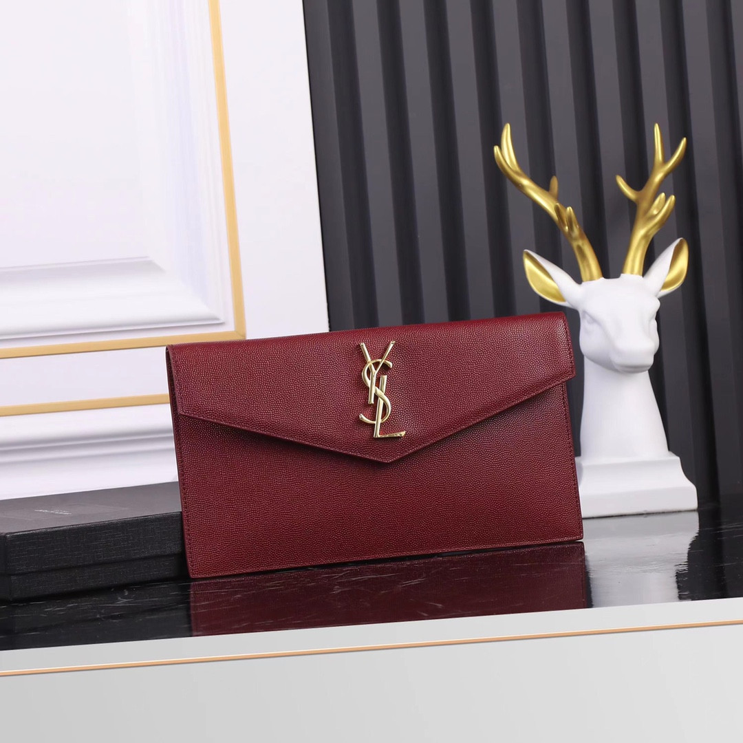 YSL UPTOWN POUCH IN GRAIN DE POUDRE EMBOSSED LEATHER ROUGE OPYUM 10.6 X 6.2 X 0.7 INCHES
