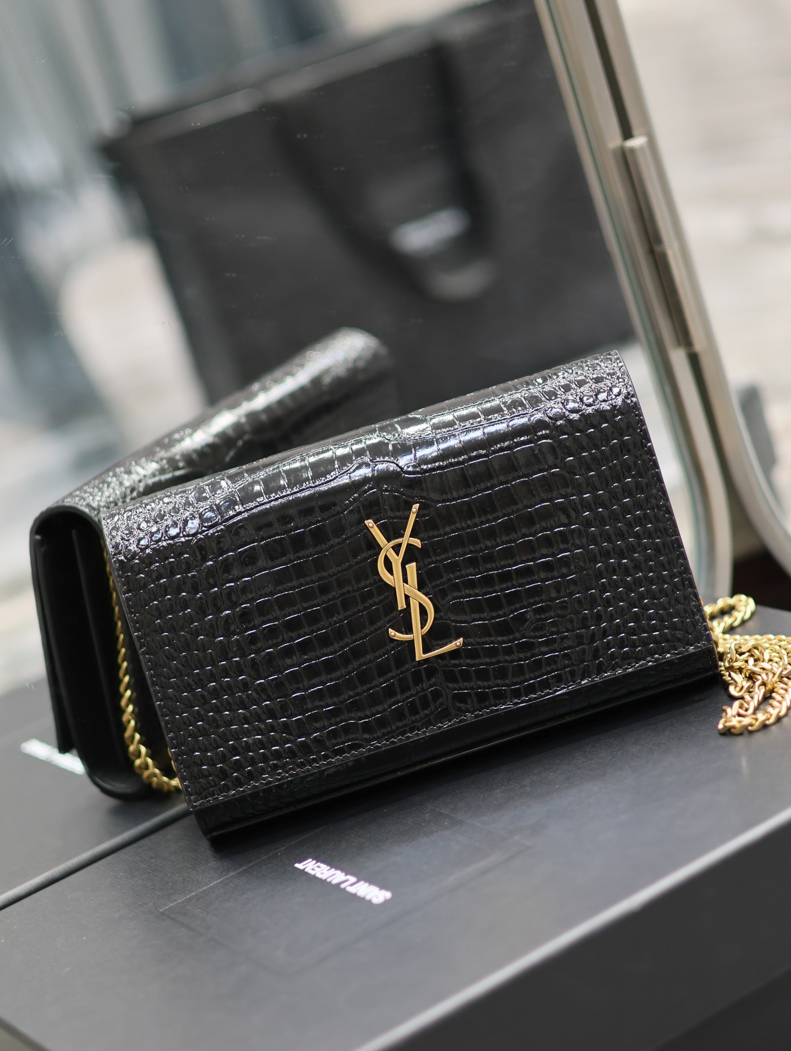YSL CASSANDRE CHAIN WALLET IN CROCODILE-EMBOSSED SHINY LEATHER