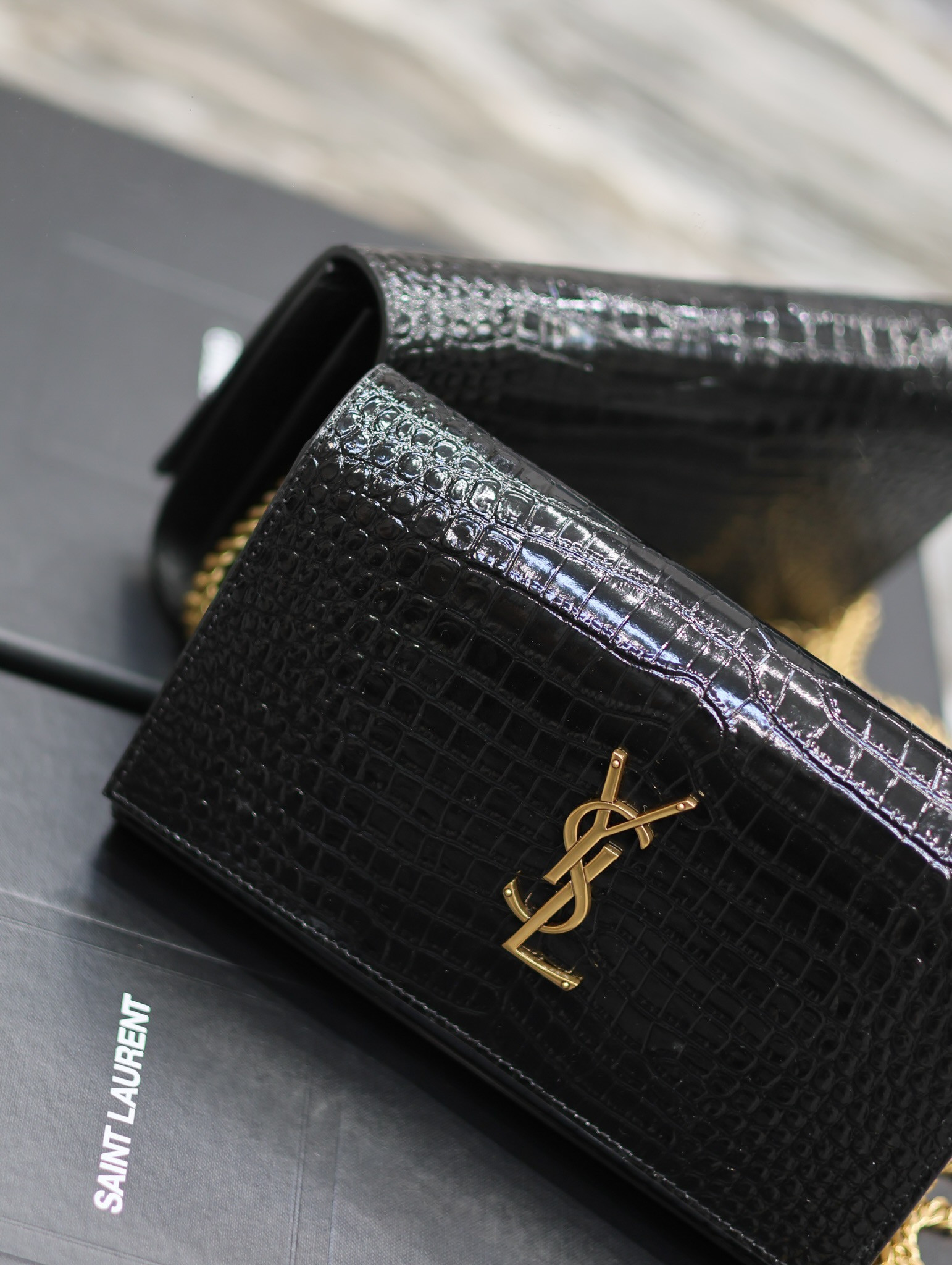YSL CASSANDRE CHAIN WALLET IN CROCODILE-EMBOSSED SHINY LEATHER