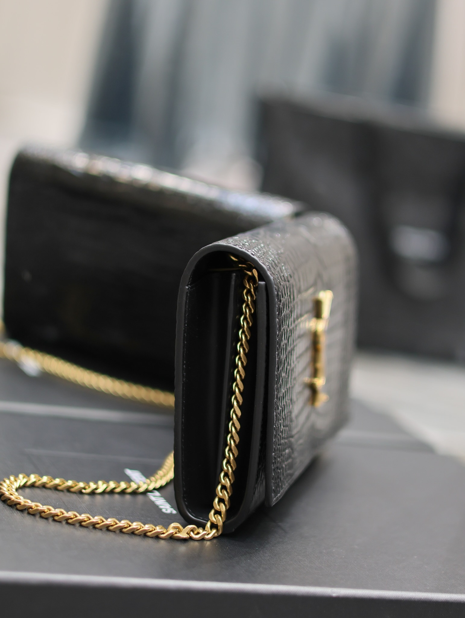 YSL CASSANDRE CHAIN WALLET IN CROCODILE-EMBOSSED SHINY LEATHER