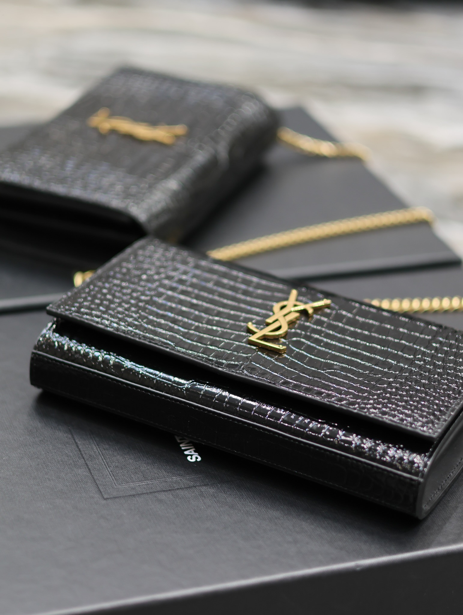 YSL CASSANDRE CHAIN WALLET IN CROCODILE-EMBOSSED SHINY LEATHER