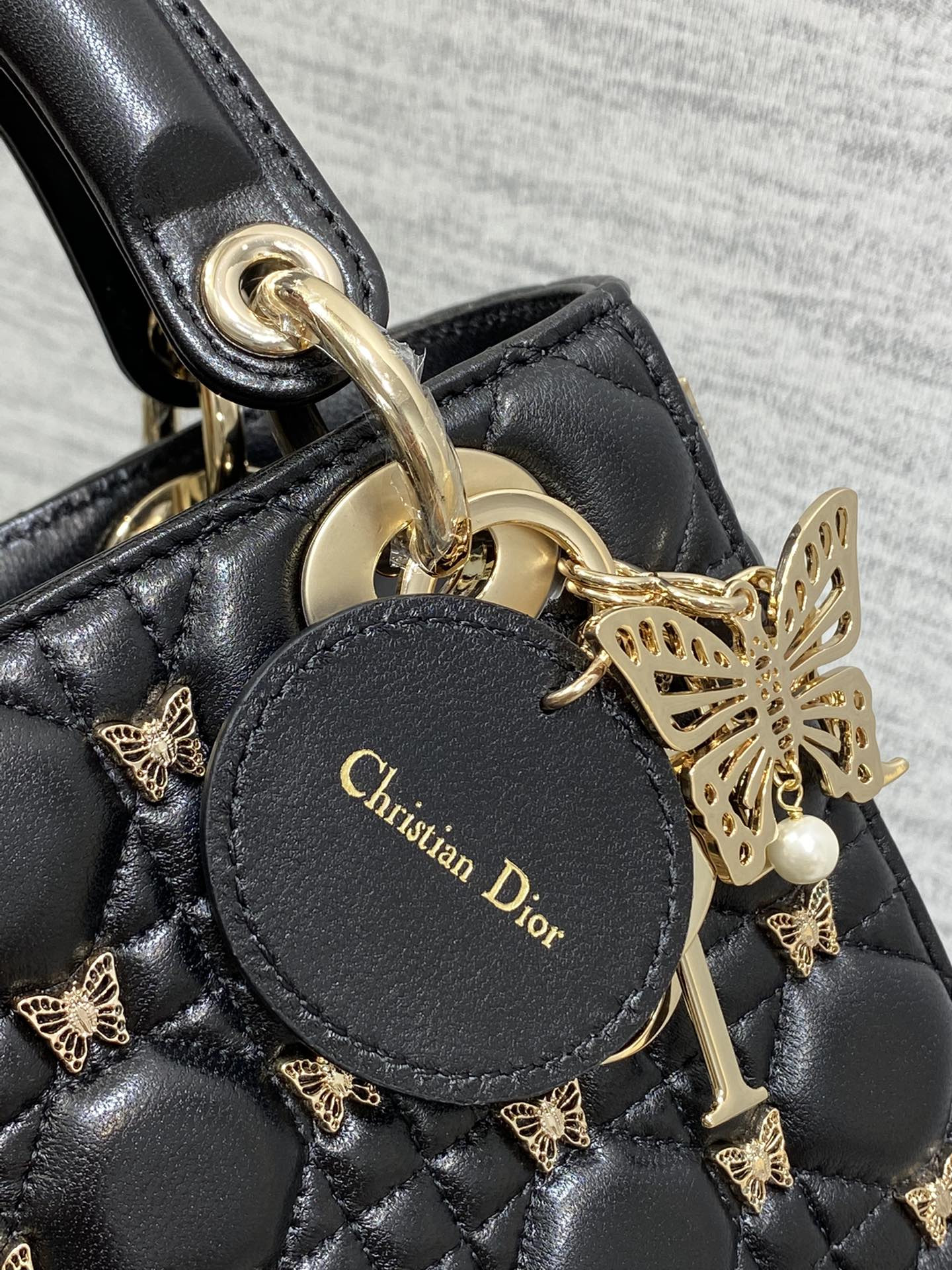 SMALL LADY DIOR Black with Butterfly Studs