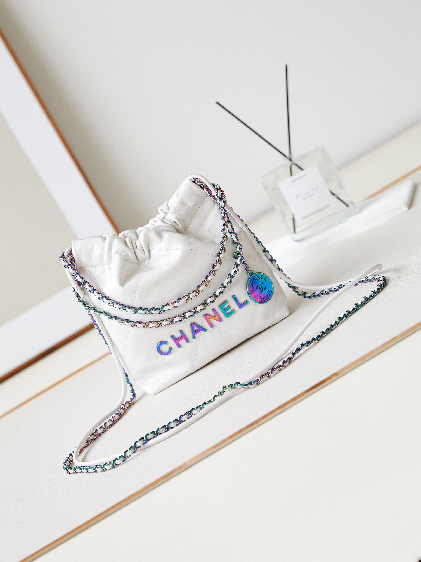 CHANEL 22 MINI HANDBAG Shiny Calfskin & Rainbow Metal White 7.8 × 7.4 × 2.3 in