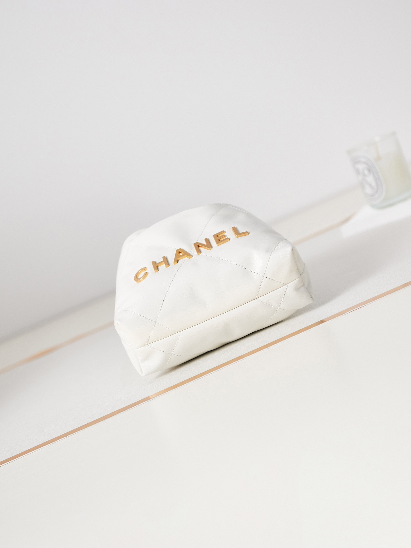 CHANEL 22 MINI HANDBAG Shiny Calfskin & Gold-Tone Metal white 7.8 × 7.4 × 2.3 in