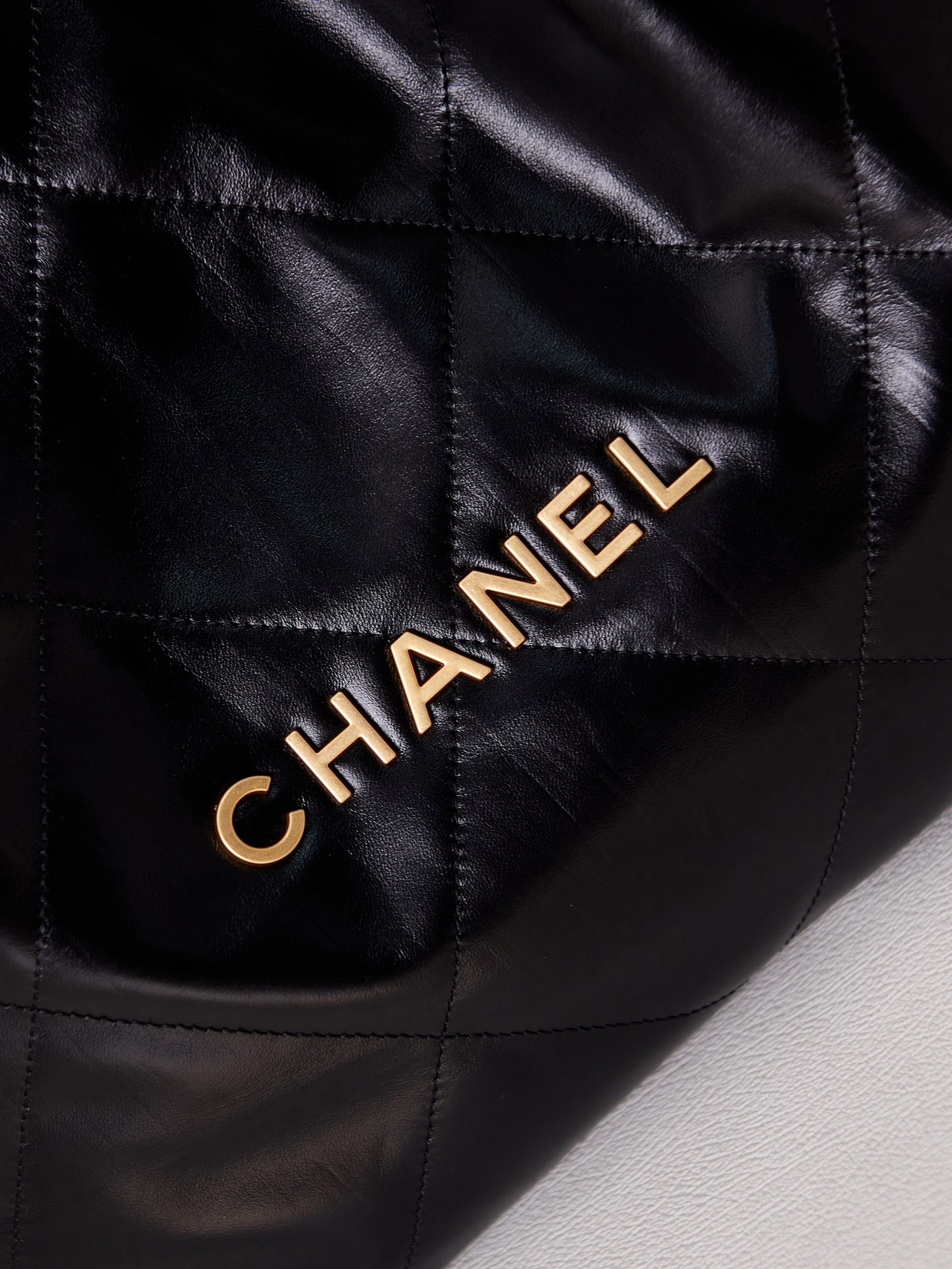 CHANEL 22 HANDBAG Shiny Calfskin & Gold-Tone Metal Black 15.2×16.4×3.1 in