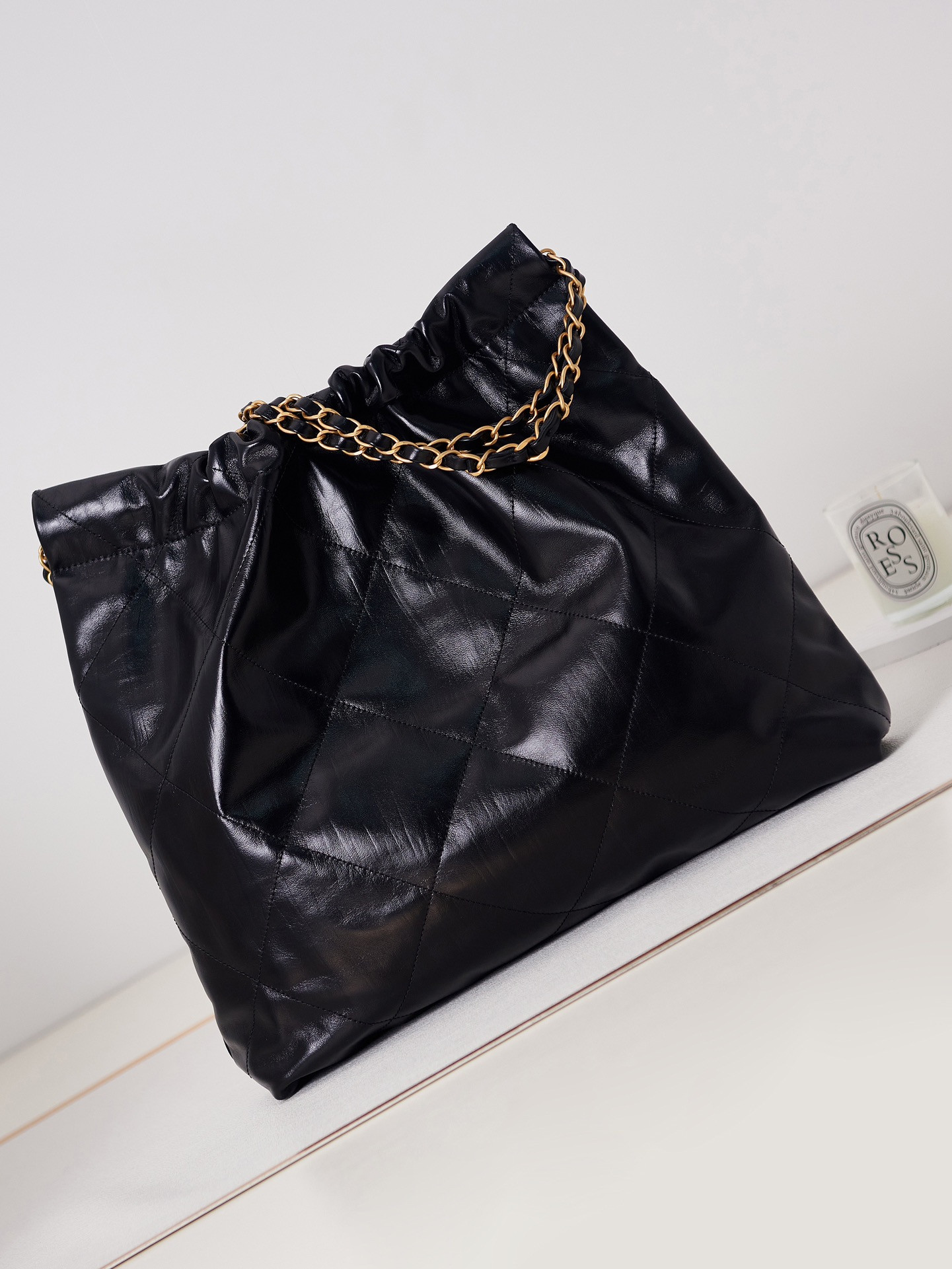 CHANEL 22 HANDBAG Shiny Calfskin & Gold-Tone Metal Black 15.2×16.4×3.1 in