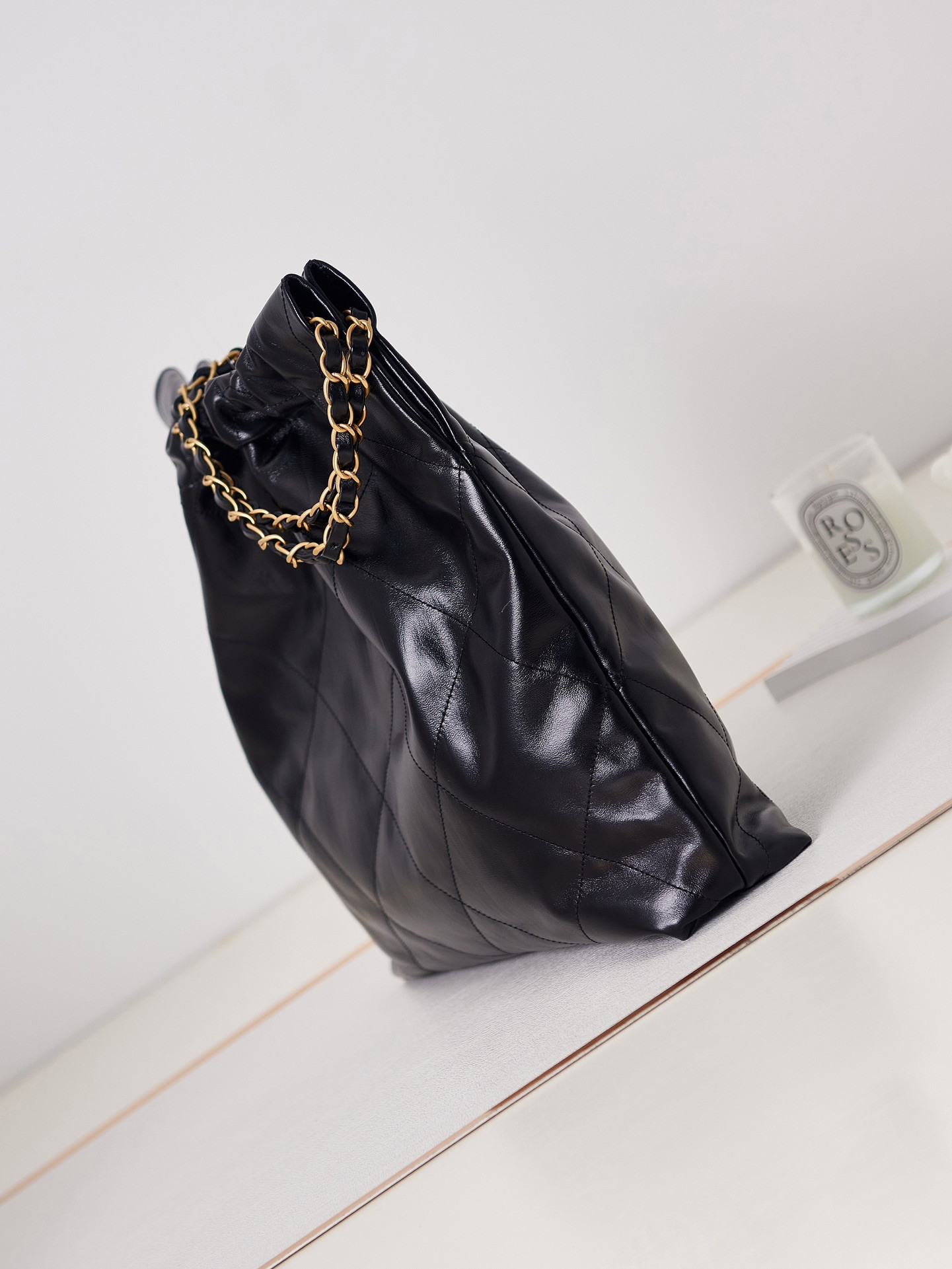 CHANEL 22 HANDBAG Shiny Calfskin & Gold-Tone Metal Black 15.2×16.4×3.1 in
