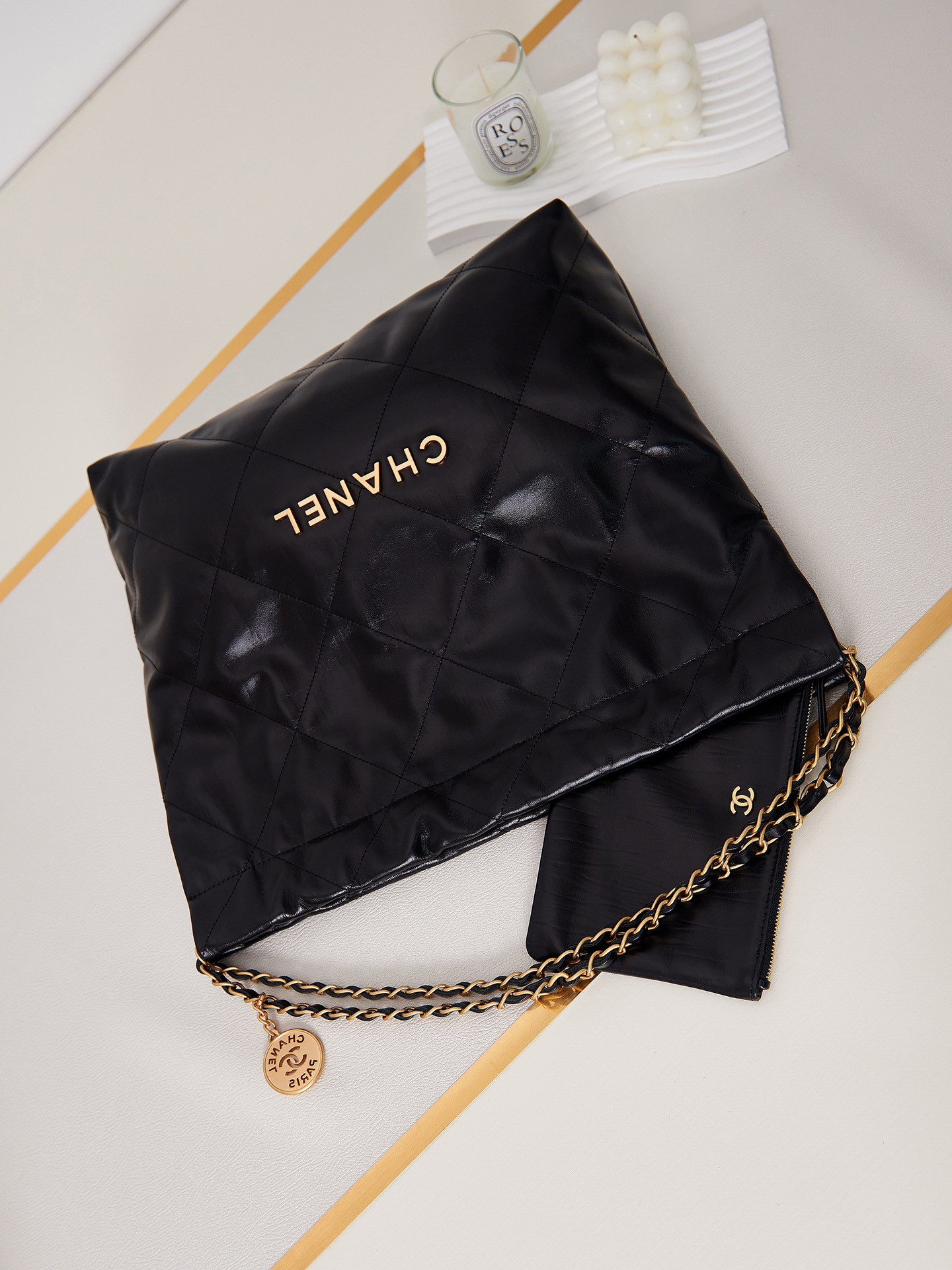 CHANEL 22 HANDBAG Shiny Calfskin & Gold-Tone Metal Black 15.2×16.4×3.1 in