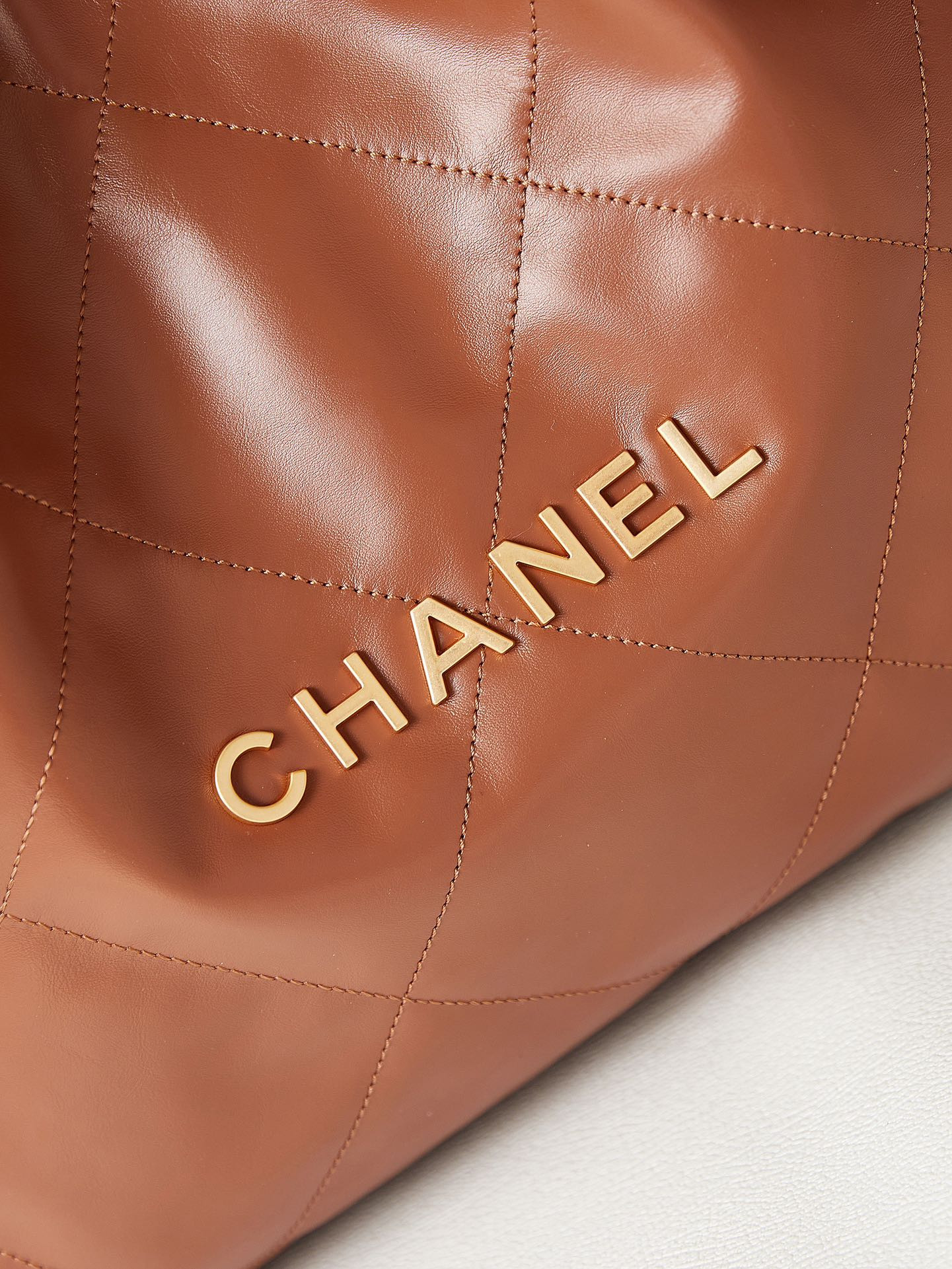 CHANEL 22 SMALL HANDBAG Shiny Calfskin BROWN 13.7×14.4×2.7 in