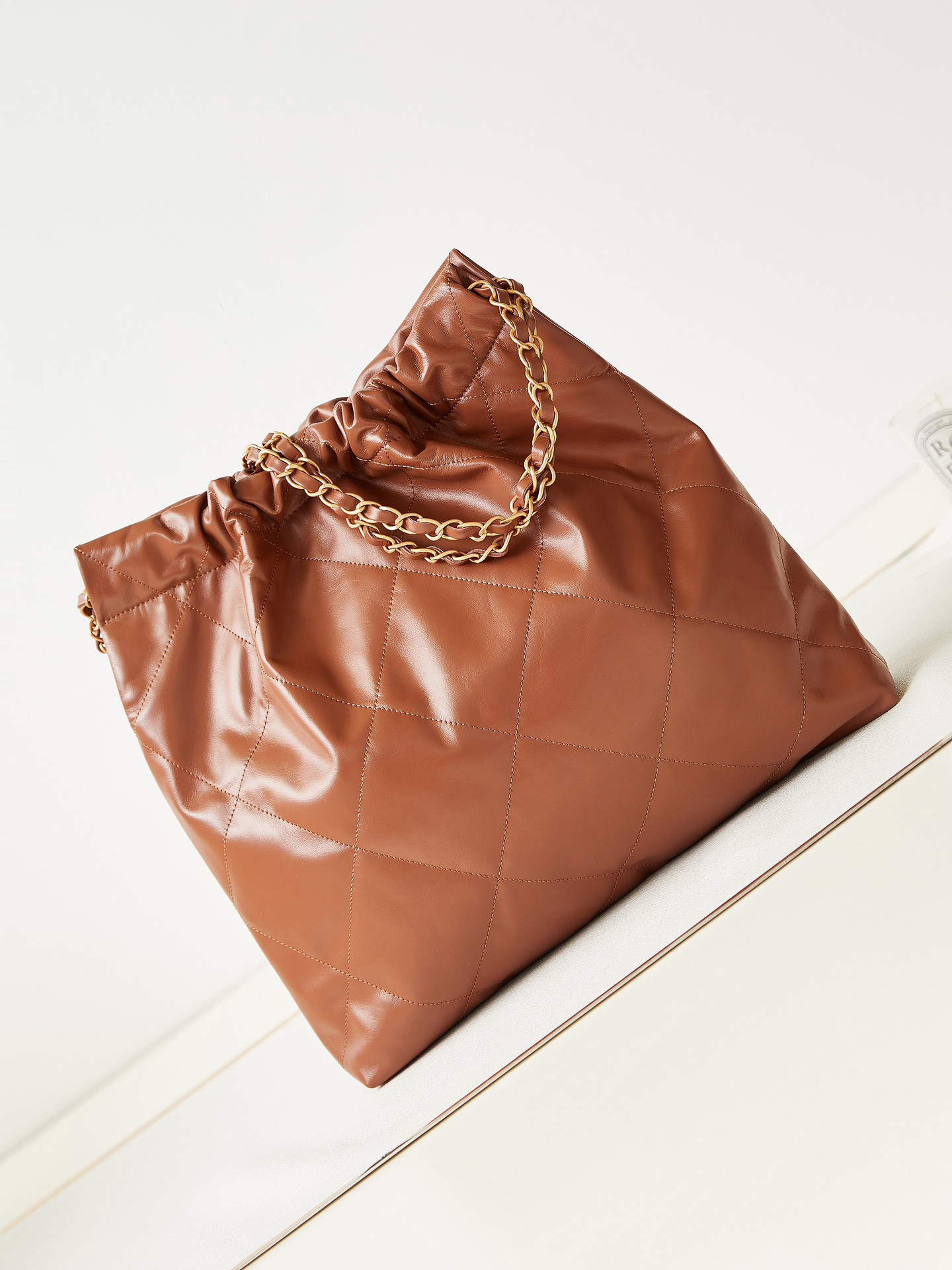 CHANEL 22 SMALL HANDBAG Shiny Calfskin BROWN 13.7×14.4×2.7 in