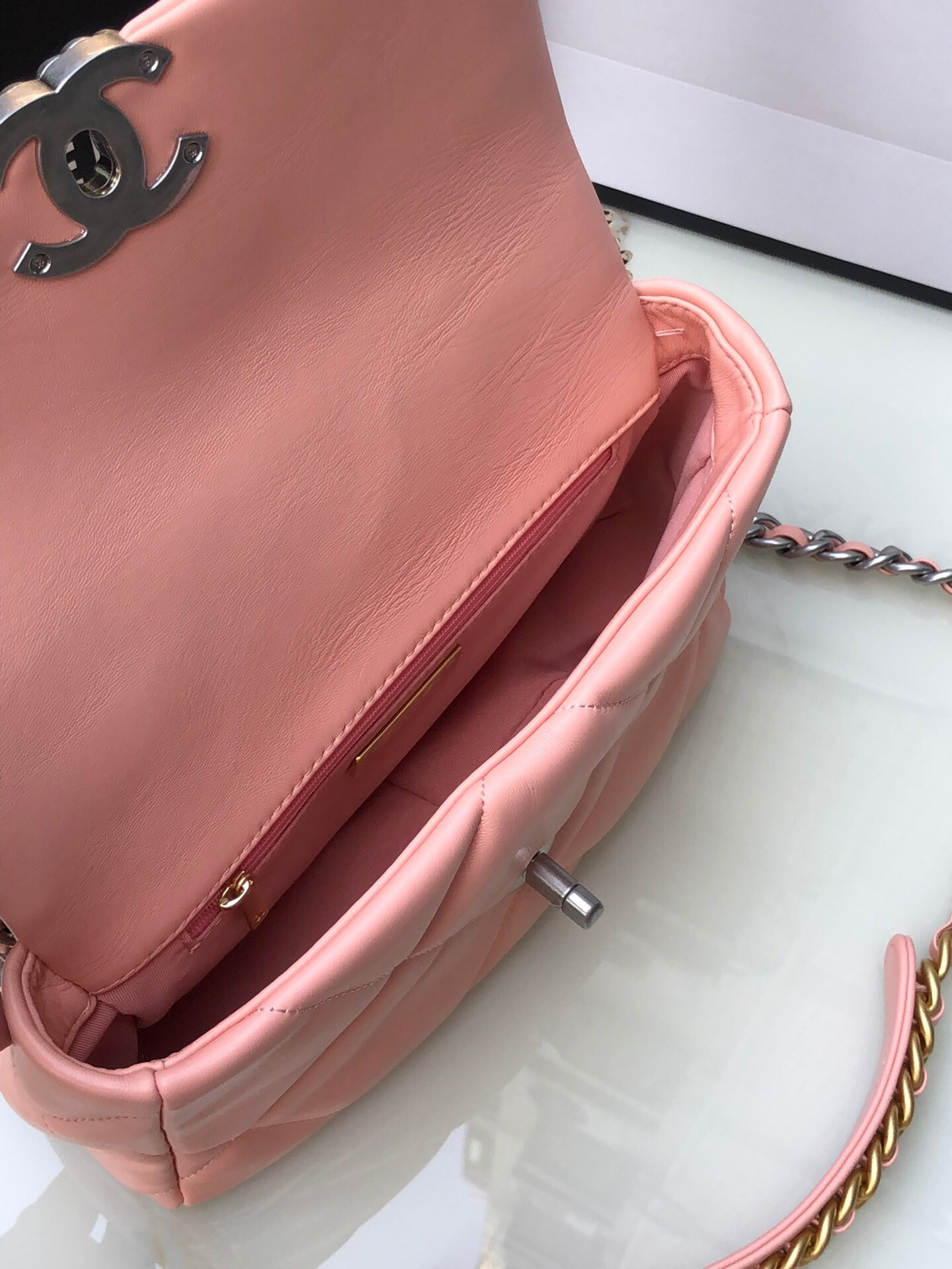 CHANEL 19 HANDBAG Shiny Leather, Gold-Tone, Silver-Tone & Ruthenium-Finish Metal Light Pink 6.2 × 10.1 × 3.5 in