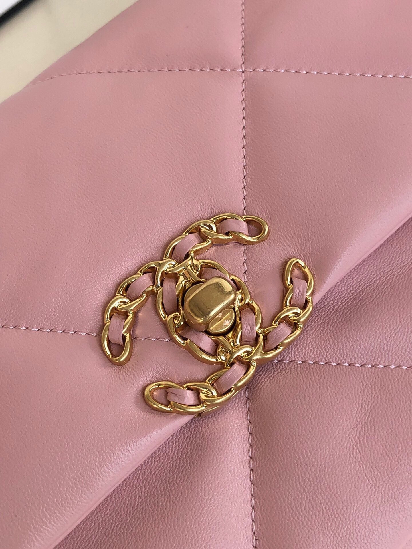 CHANEL 19 HANDBAG Shiny Leather, Gold-Tone, Silver-Tone & Ruthenium-Finish Metal Light Pink 6.2 × 10.1 × 3.5 in