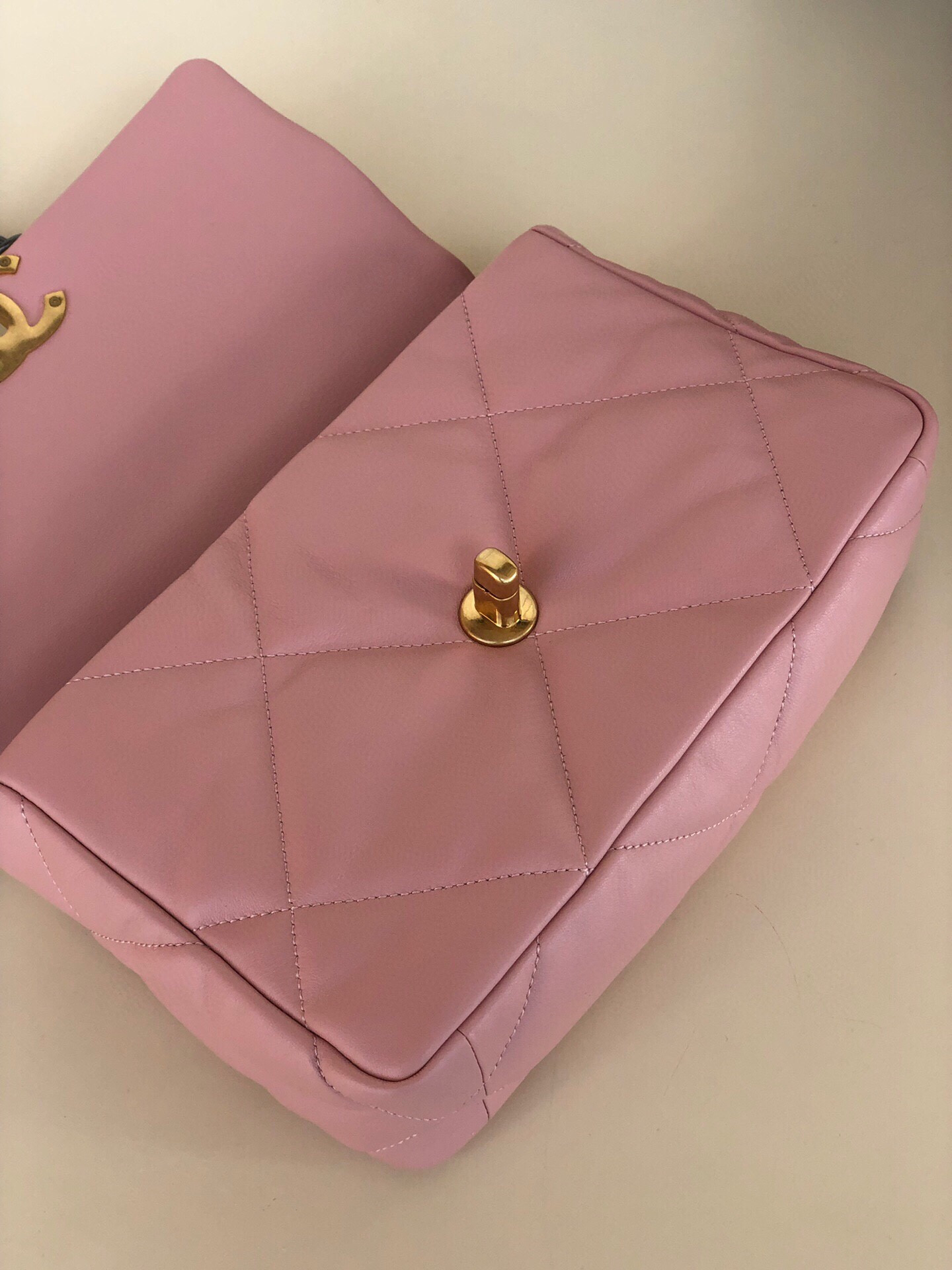 CHANEL 19 HANDBAG Shiny Leather, Gold-Tone, Silver-Tone & Ruthenium-Finish Metal Light Pink 6.2 × 10.1 × 3.5 in