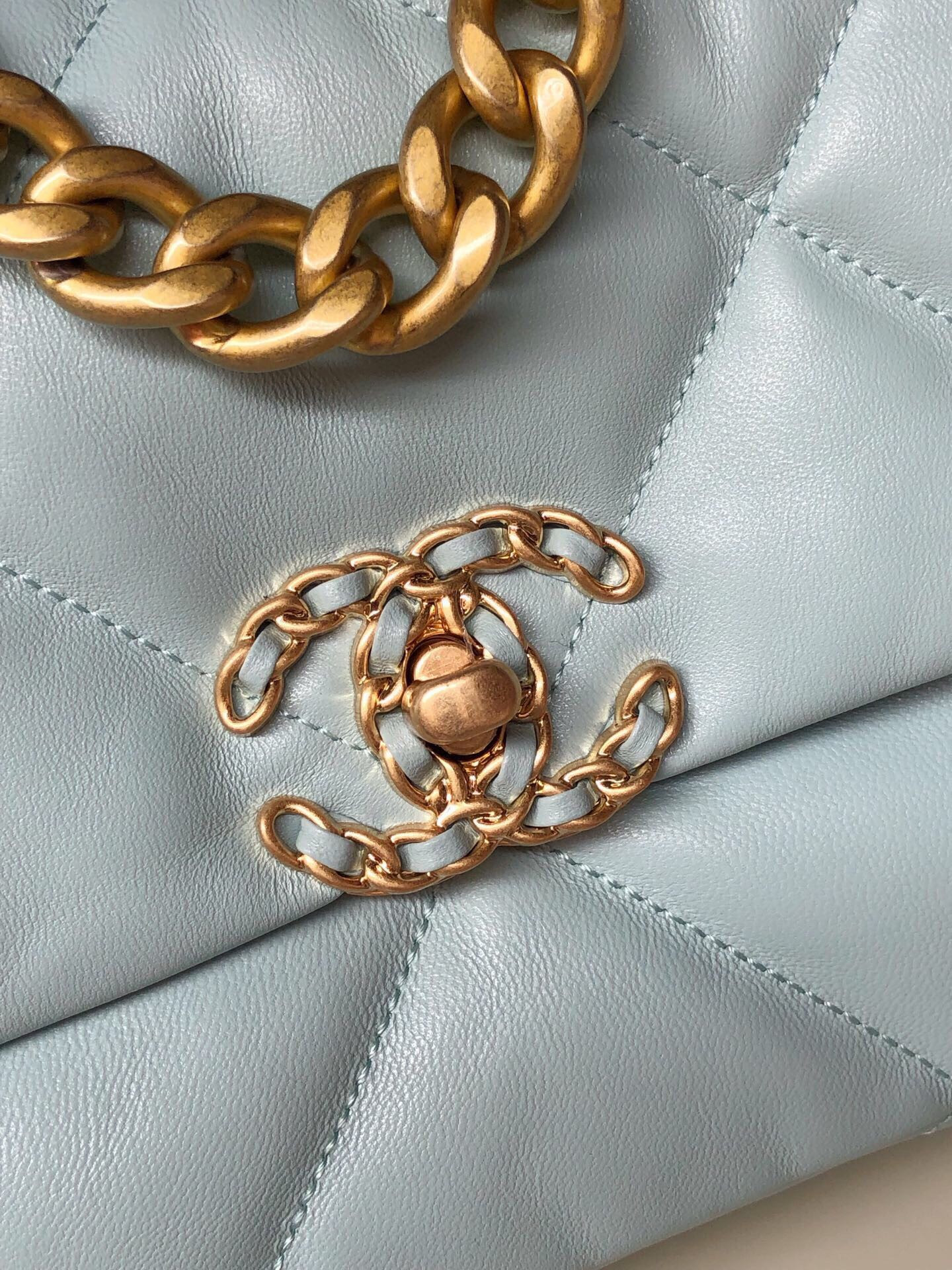 CHANEL 19 HANDBAG Shiny Leather, Gold-Tone, Silver-Tone & Ruthenium-Finish Metal Light Blue 6.2 × 10.1 × 3.5 in