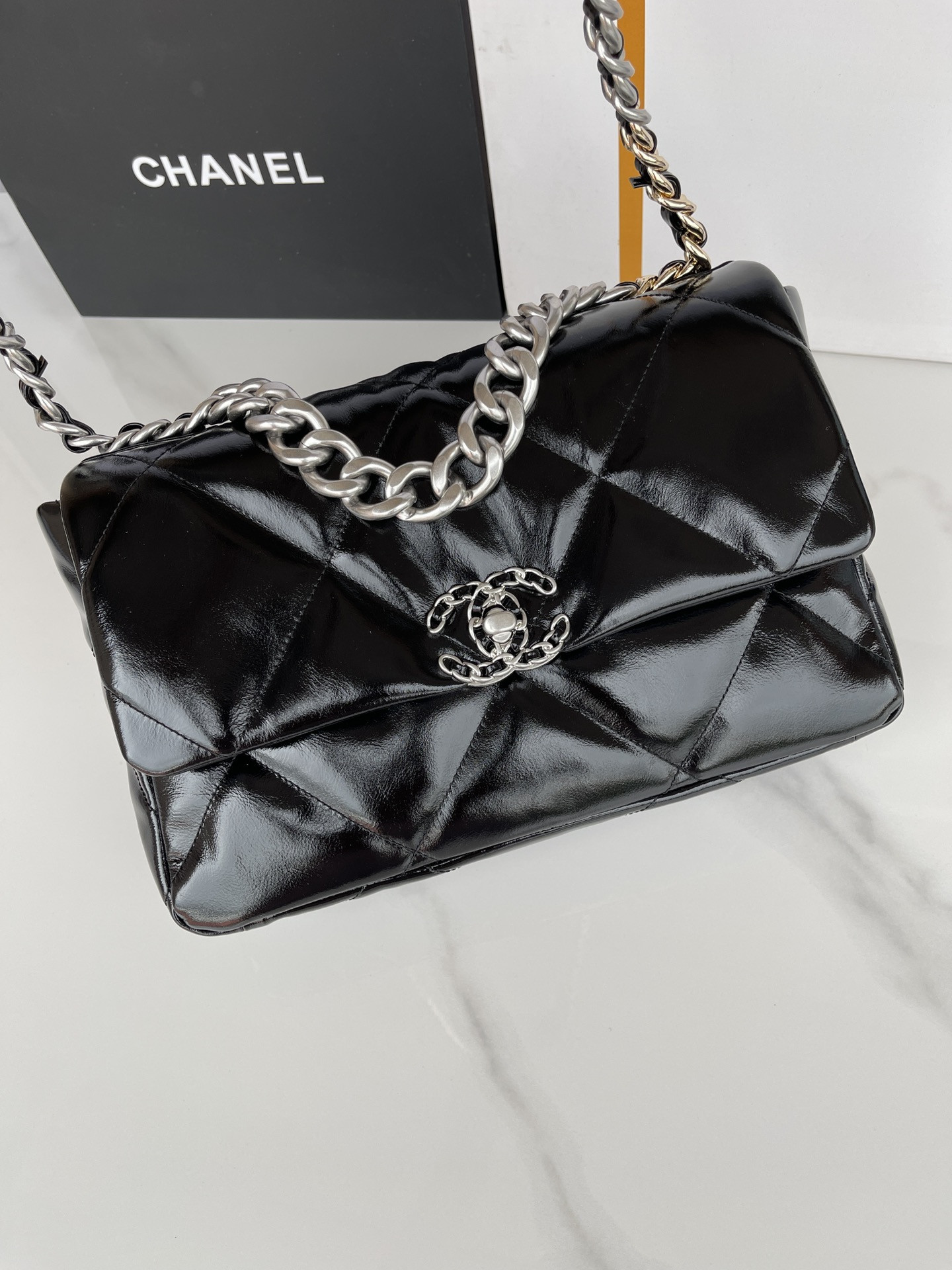 CHANEL 19 LARGE HANDBAG Shiny Leather, Gold-Tone, Silver-Tone & Ruthenium-Finish Metal Black 7.8 × 11.7 × 3.9 in