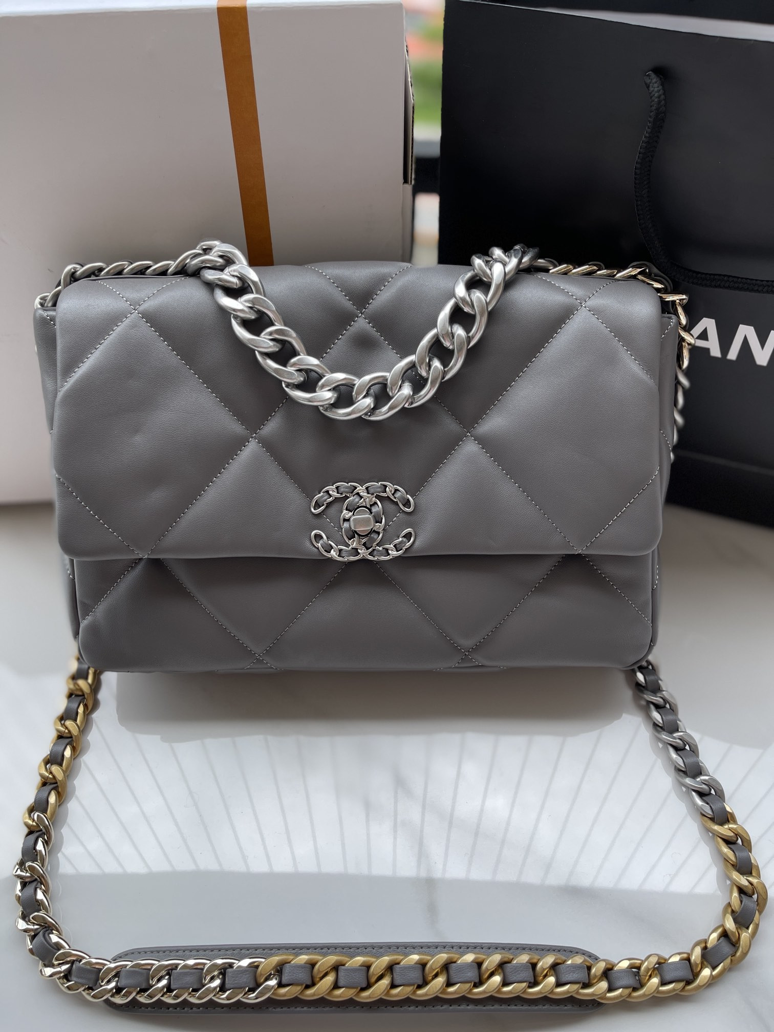 CHANEL 19 LARGE HANDBAG Shiny Leather, Gold-Tone, Silver-Tone & Ruthenium-Finish Metal Gray 7.8 × 11.7 × 3.9 in