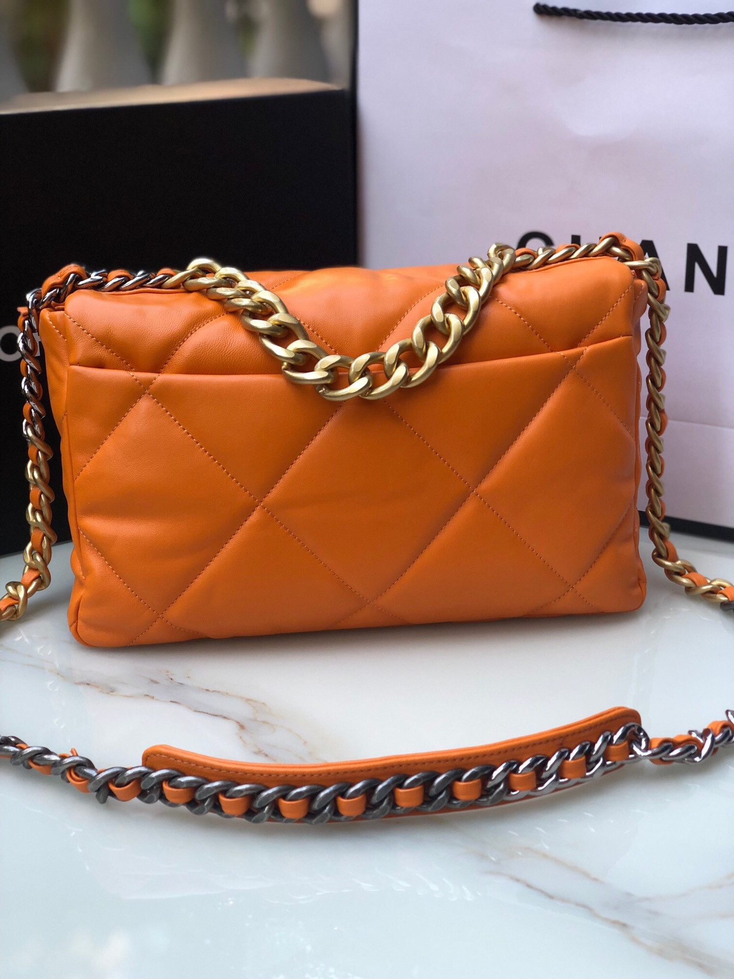 CHANEL 19 LARGE HANDBAG Shiny Leather, Gold-Tone, Silver-Tone & Ruthenium-Finish Metal Orange 7.8 × 11.7 × 3.9 in
