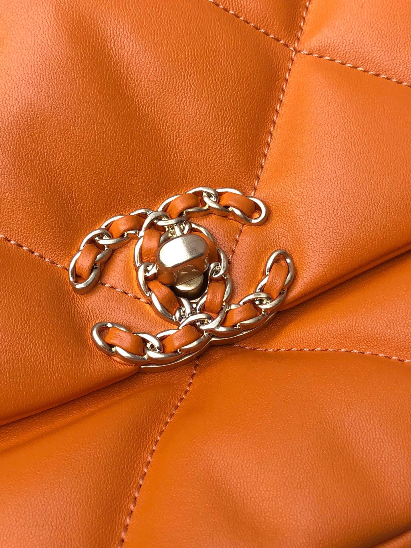 CHANEL 19 LARGE HANDBAG Shiny Leather, Gold-Tone, Silver-Tone & Ruthenium-Finish Metal Orange 7.8 × 11.7 × 3.9 in