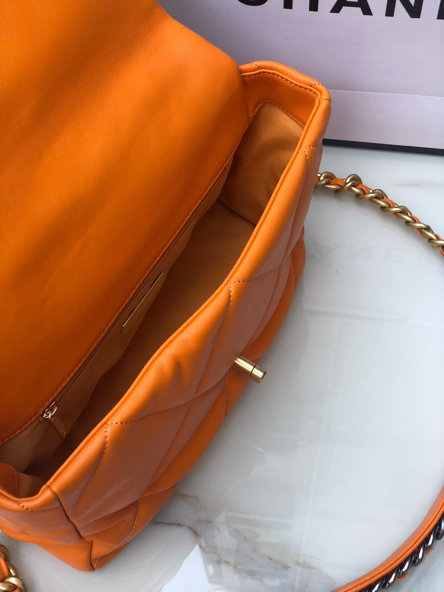CHANEL 19 LARGE HANDBAG Shiny Leather, Gold-Tone, Silver-Tone & Ruthenium-Finish Metal Orange 7.8 × 11.7 × 3.9 in