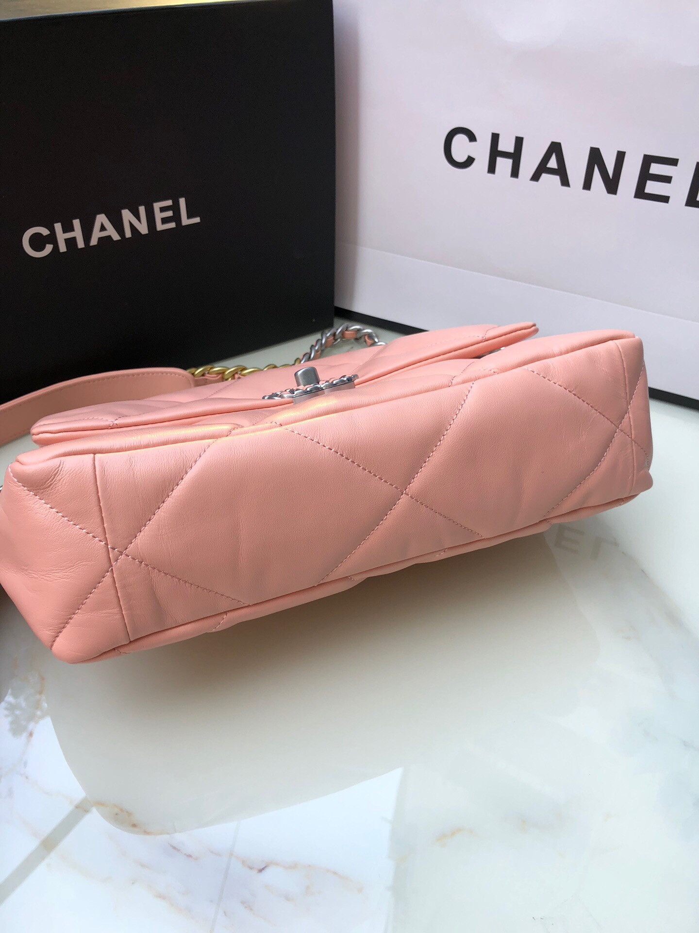 CHANEL 19 LARGE HANDBAG Shiny Leather, Gold-Tone, Silver-Tone & Ruthenium-Finish Metal Light Pink 7.8 × 11.7 × 3.9 in