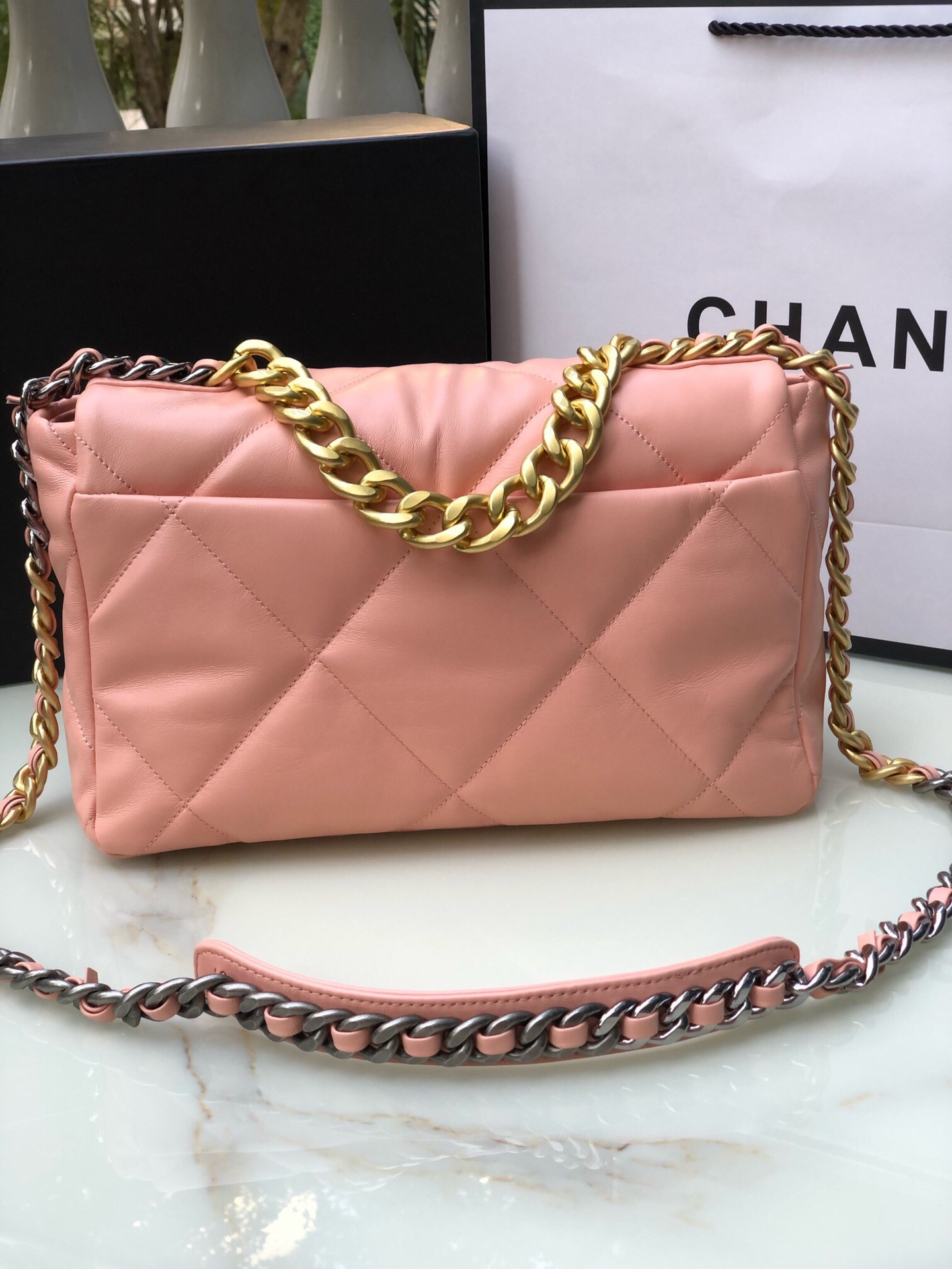 CHANEL 19 LARGE HANDBAG Shiny Leather, Gold-Tone, Silver-Tone & Ruthenium-Finish Metal Light Pink 7.8 × 11.7 × 3.9 in