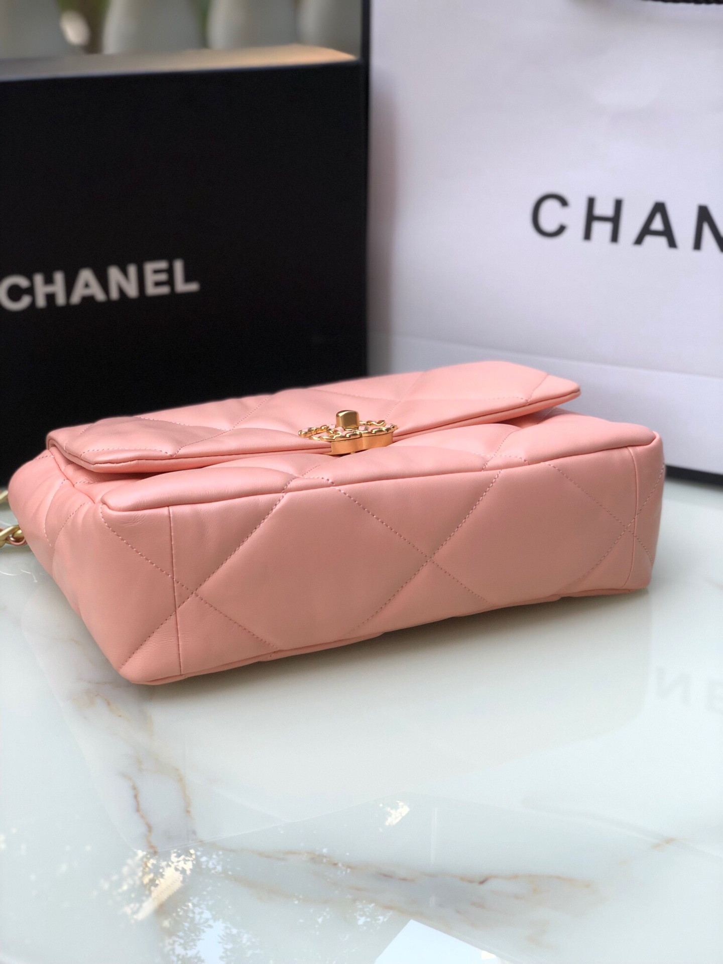 CHANEL 19 LARGE HANDBAG Shiny Leather, Gold-Tone, Silver-Tone & Ruthenium-Finish Metal Light Pink 7.8 × 11.7 × 3.9 in