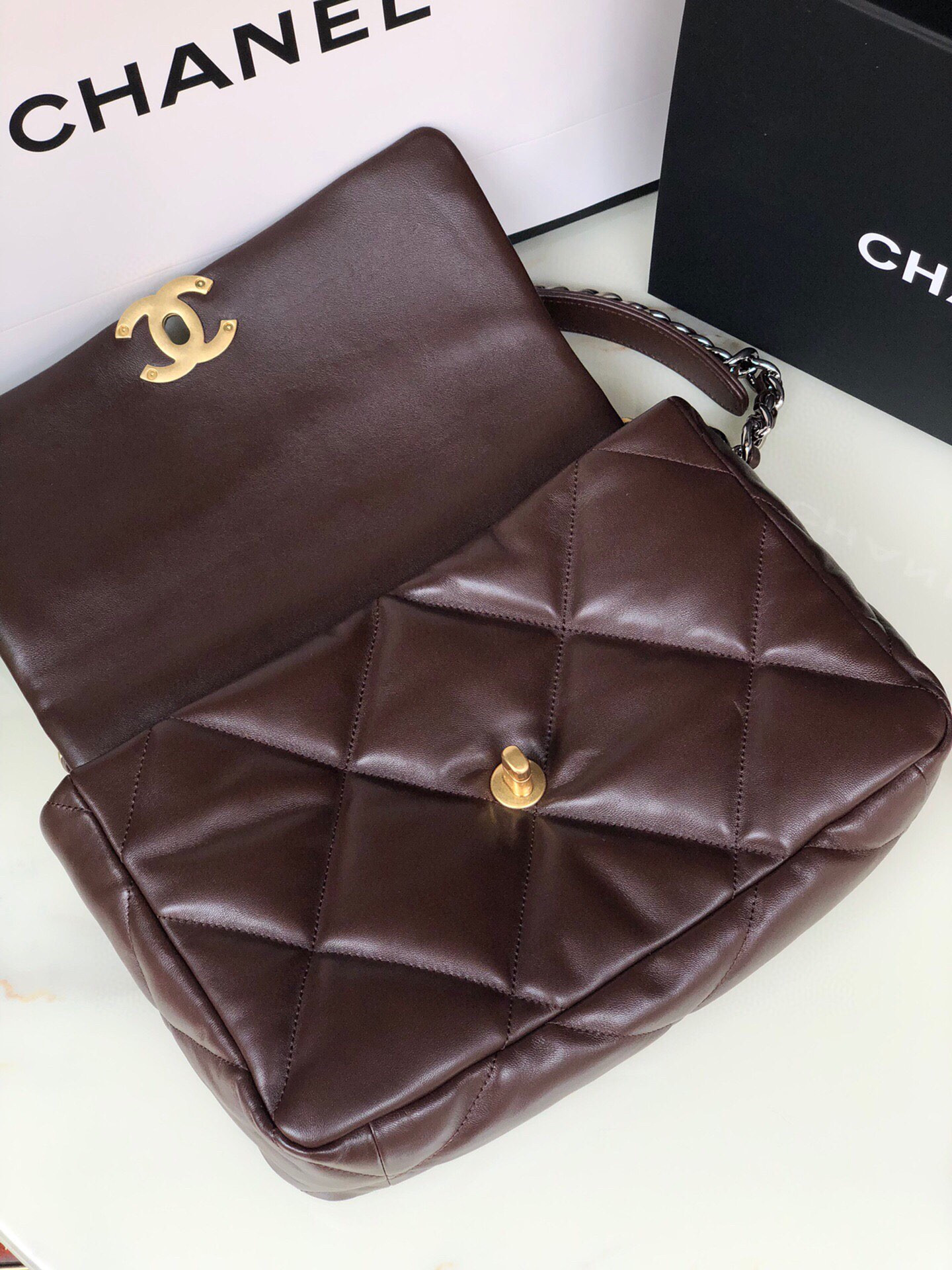 CHANEL 19 LARGE HANDBAG Shiny Leather, Gold-Tone, Silver-Tone & Ruthenium-Finish Metal Brown 7.8 × 11.7 × 3.9 in