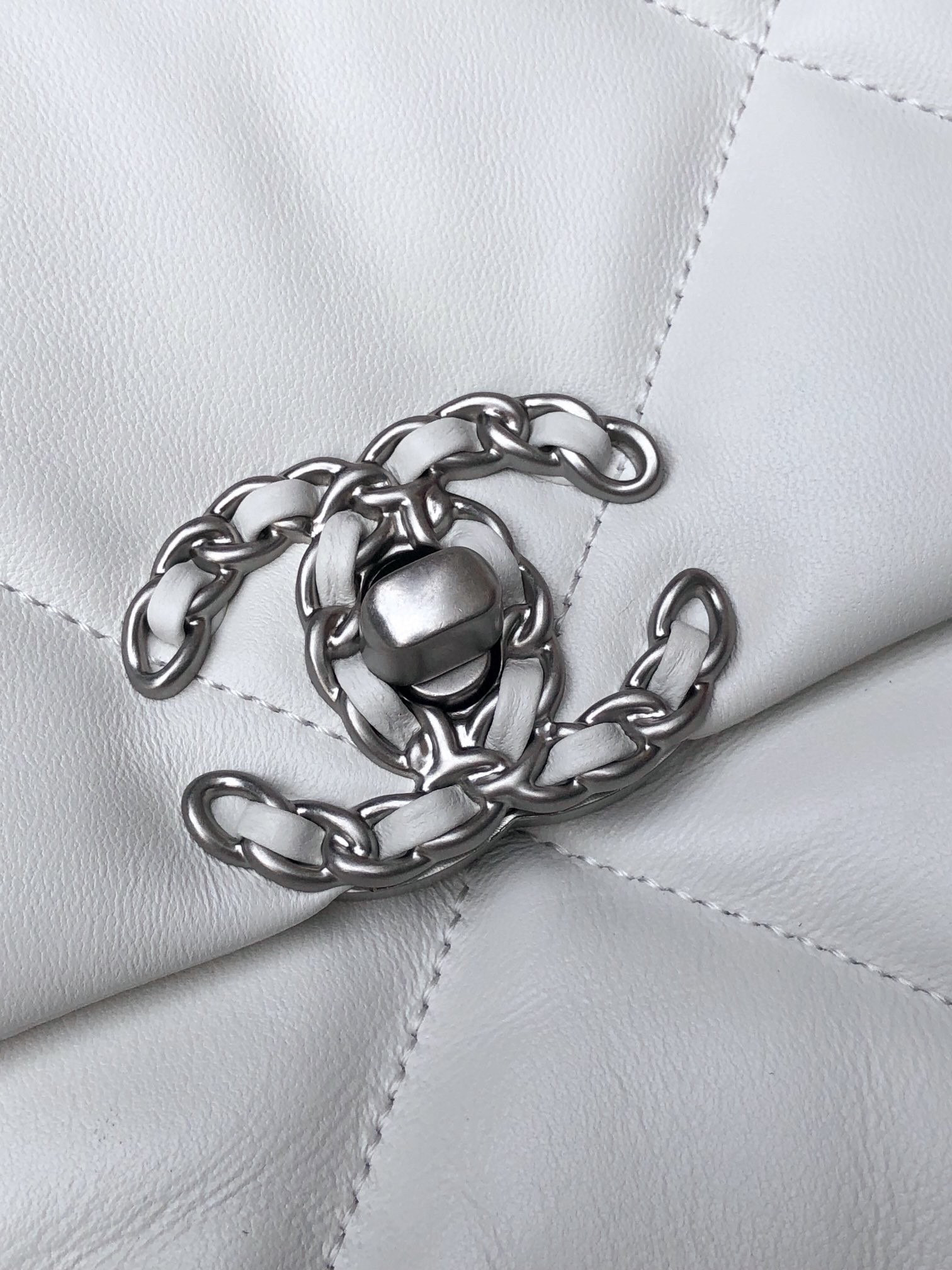 CHANEL 19 HANDBAG Shiny Leather, Gold-Tone, Silver-Tone & Ruthenium-Finish Metal White 6.2 × 10.1 × 3.5 in