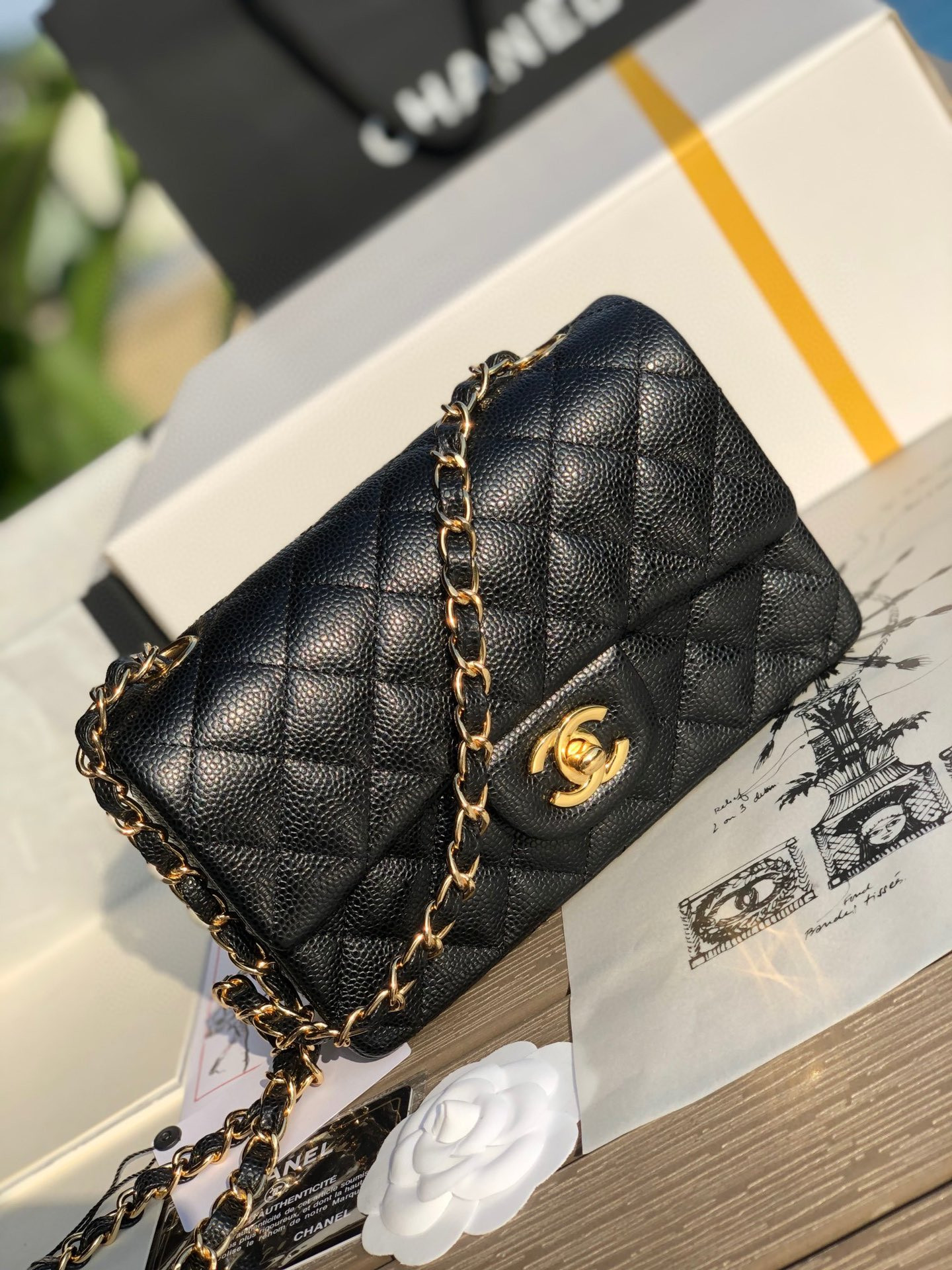 CHANEL MINI FLAP BAG BLACK WITH GOLD-TONE MENTAL 4.7 × 7.8 × 2.3 in
