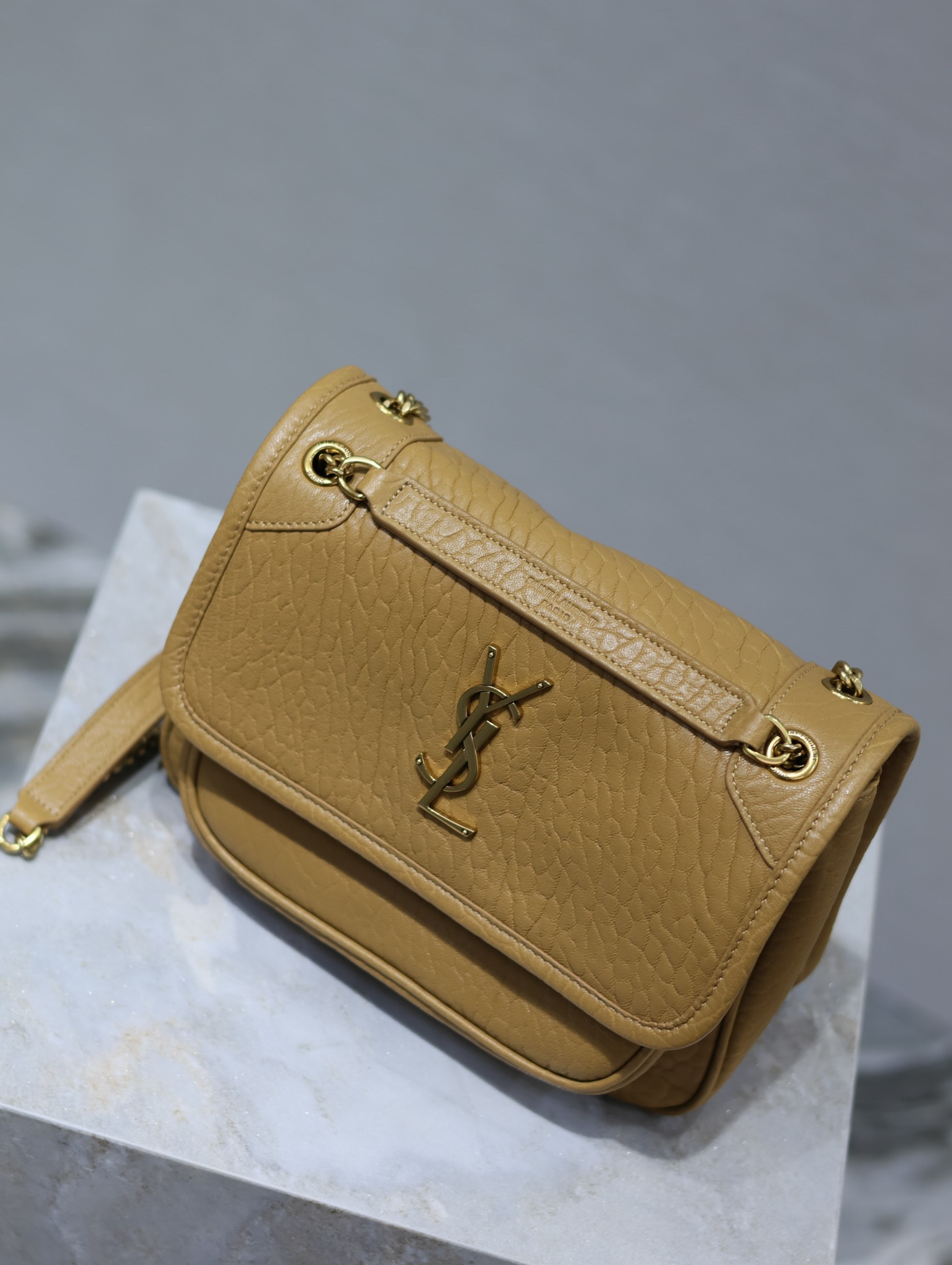 YSL NIKI BABY IN VINTAGE LEATHER DARK CORK 8.2 X 6 X 2.9 INCHES