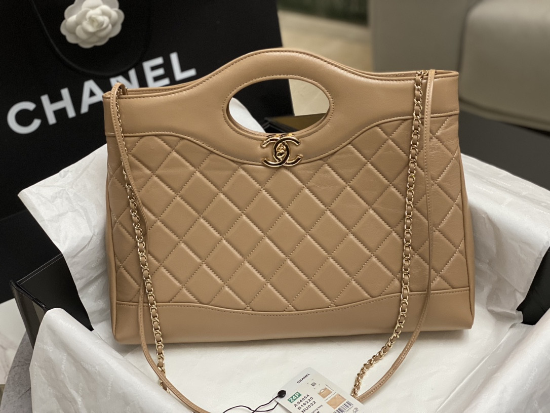 CHANEL SHOPPING BAG Shiny Lambskin & Gold-Tone Metal 11.7 × 14 × 3.5 in