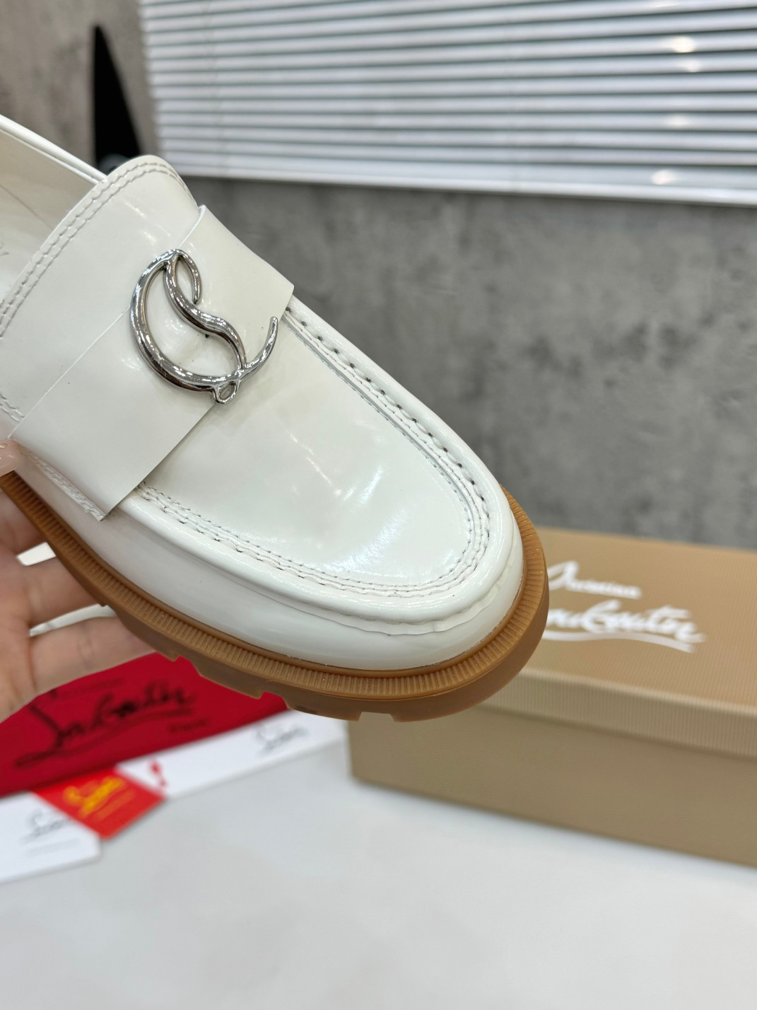 UA Christian Louboutin(CL) logo design,the latest runway version of the red-soled shoes