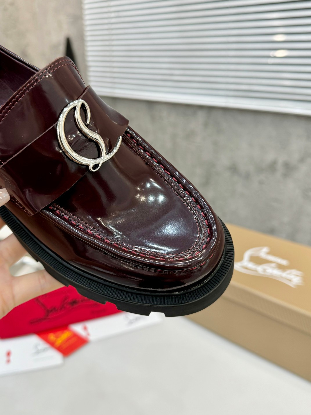 UA Christian Louboutin(CL) logo design,the latest runway version of the red-soled shoes