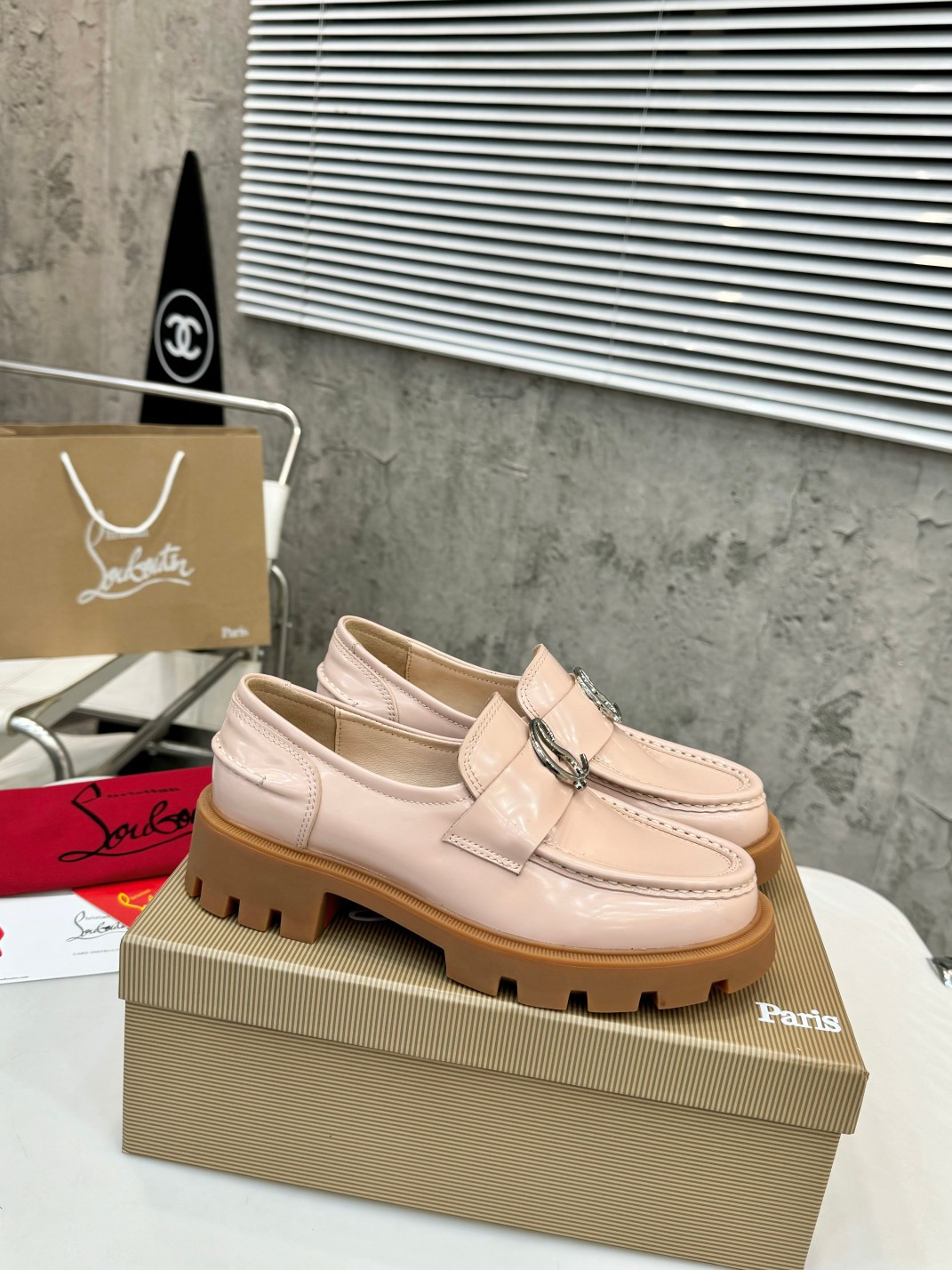 UA Christian Louboutin(CL) logo design,the latest runway version of the red-soled shoes