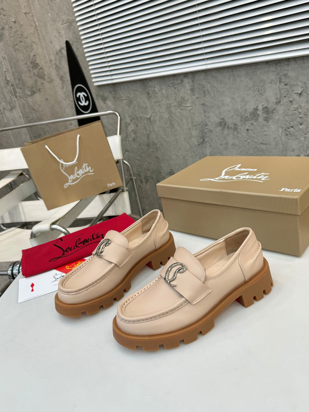 UA Christian Louboutin(CL) logo design,the latest runway version of the red-soled shoes