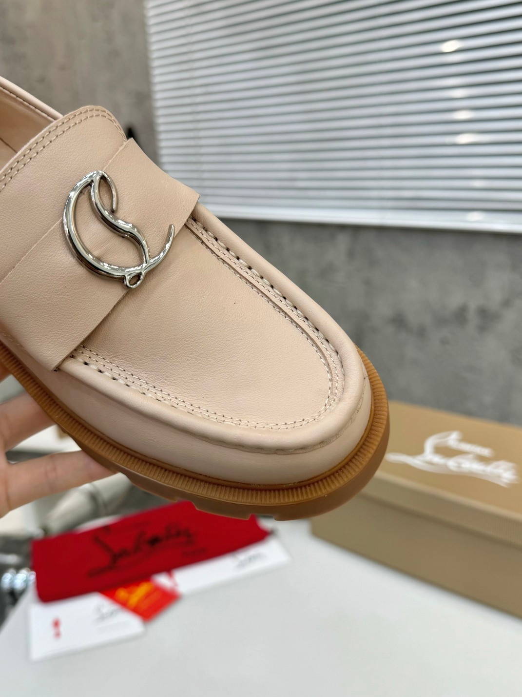 UA Christian Louboutin(CL) logo design,the latest runway version of the red-soled shoes