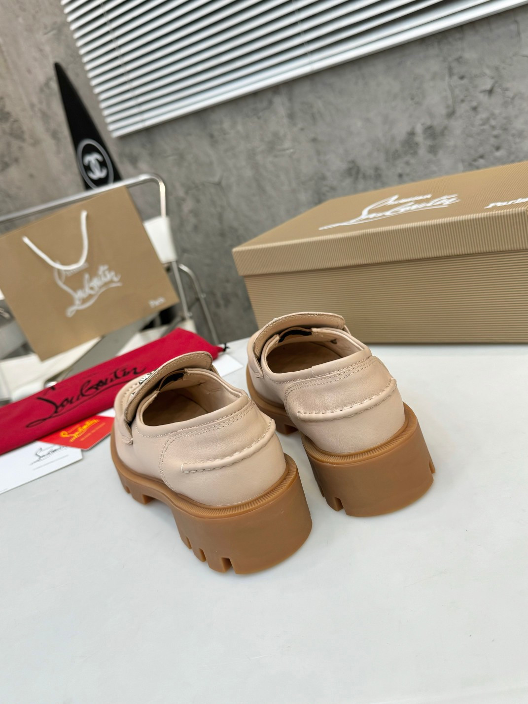 UA Christian Louboutin(CL) logo design,the latest runway version of the red-soled shoes