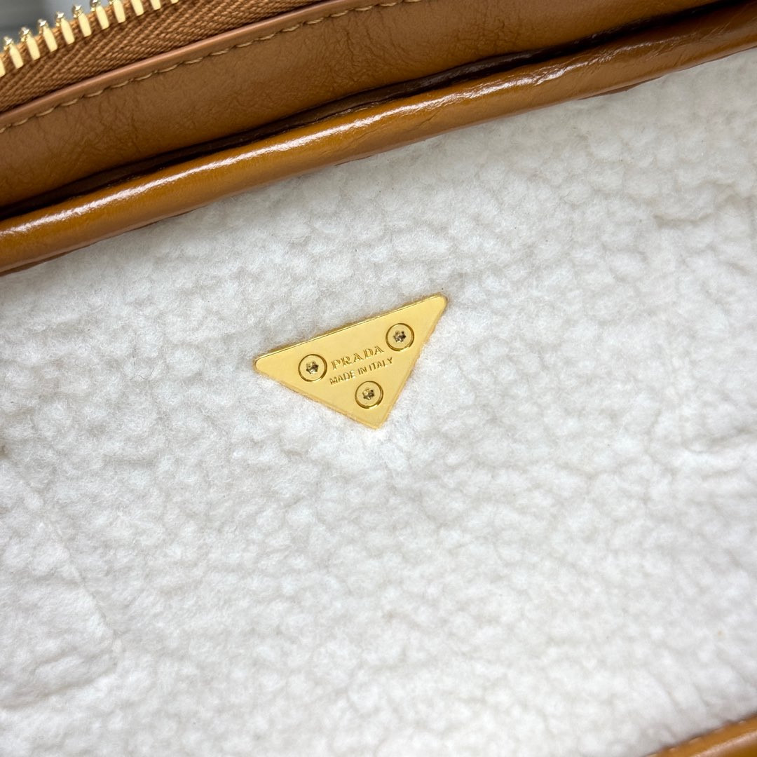 Prada Medium shearling two-handle bag 12x 27x 6cm