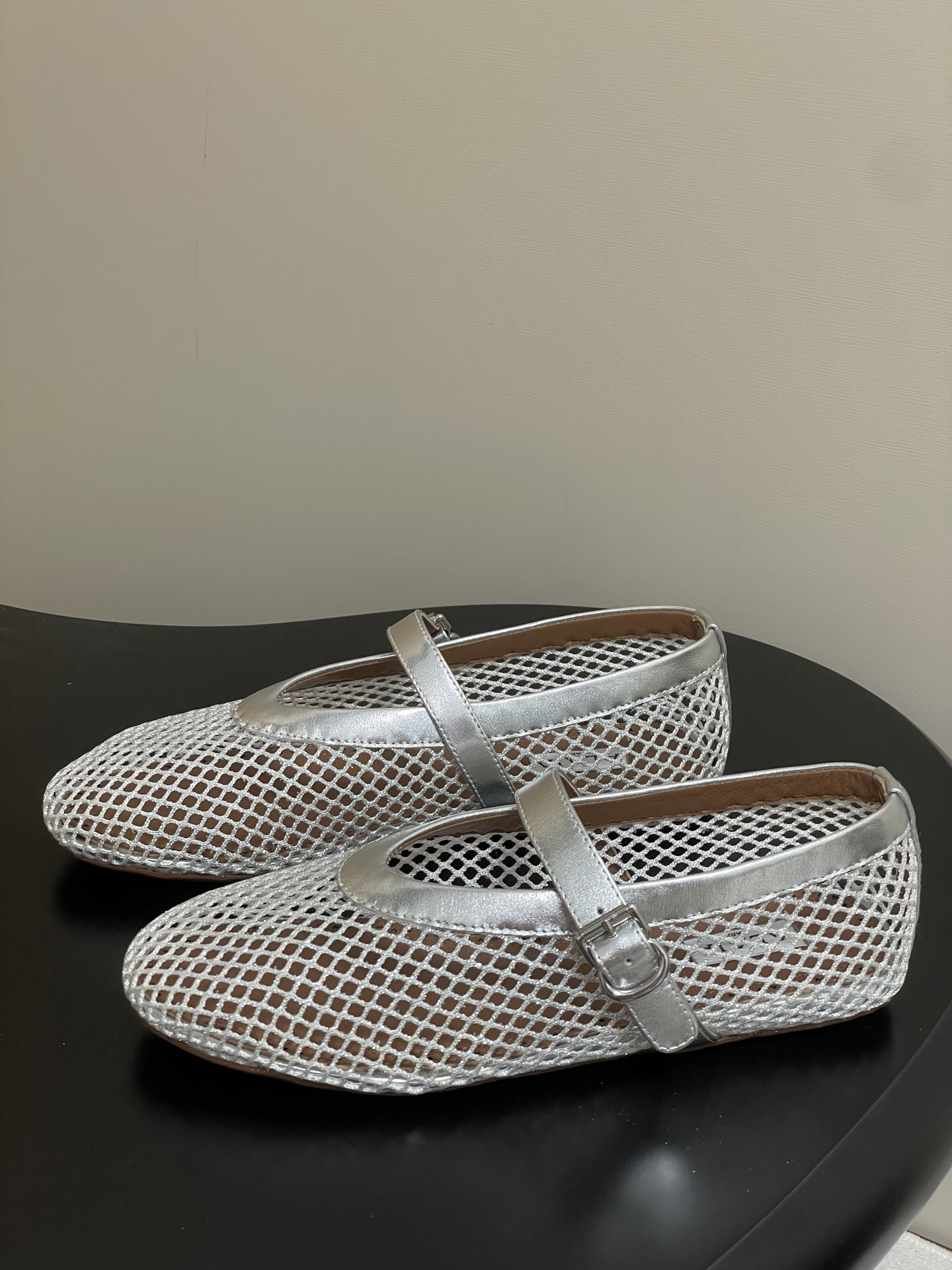 UA ALAÏA BALLET FLATS IN FISHNET